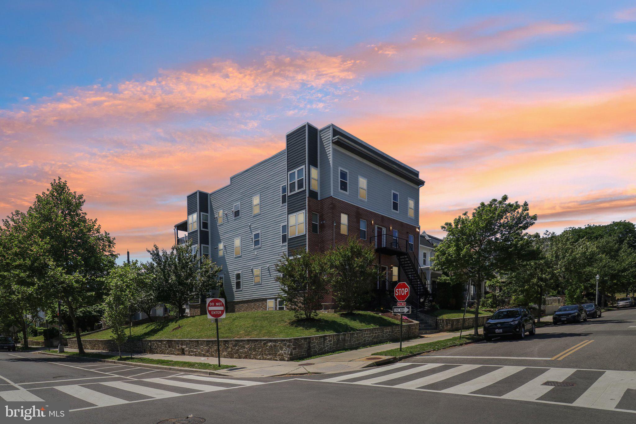 233 S Street Northeast, Unit 5 Washington, DC 20002 - Photo 37 of 41 Modern residence under a vibrant sky.