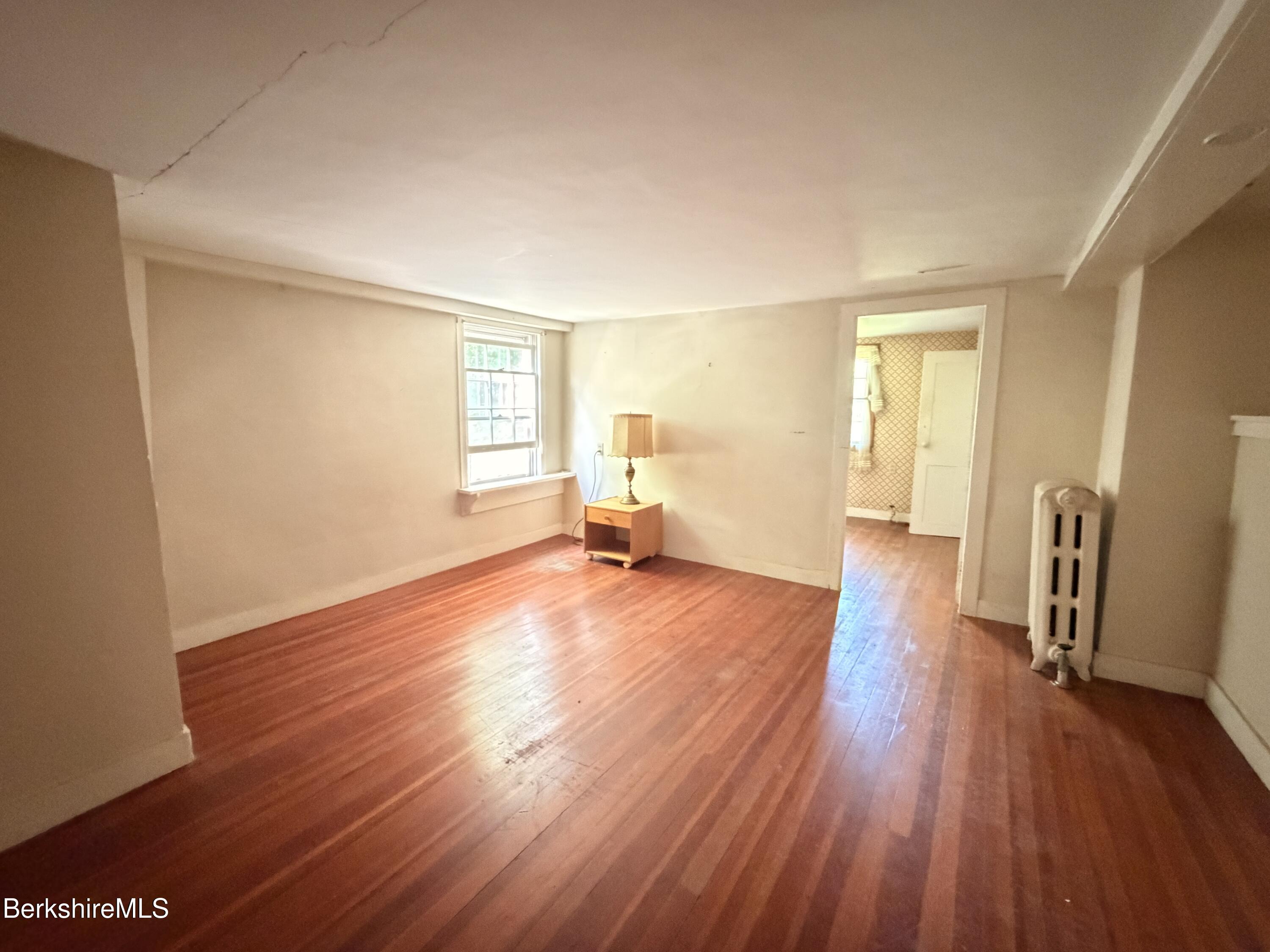 254 Main Street Sheffield, MA 01257 - Photo 13 of 13 a view of empty room with wooden floor
