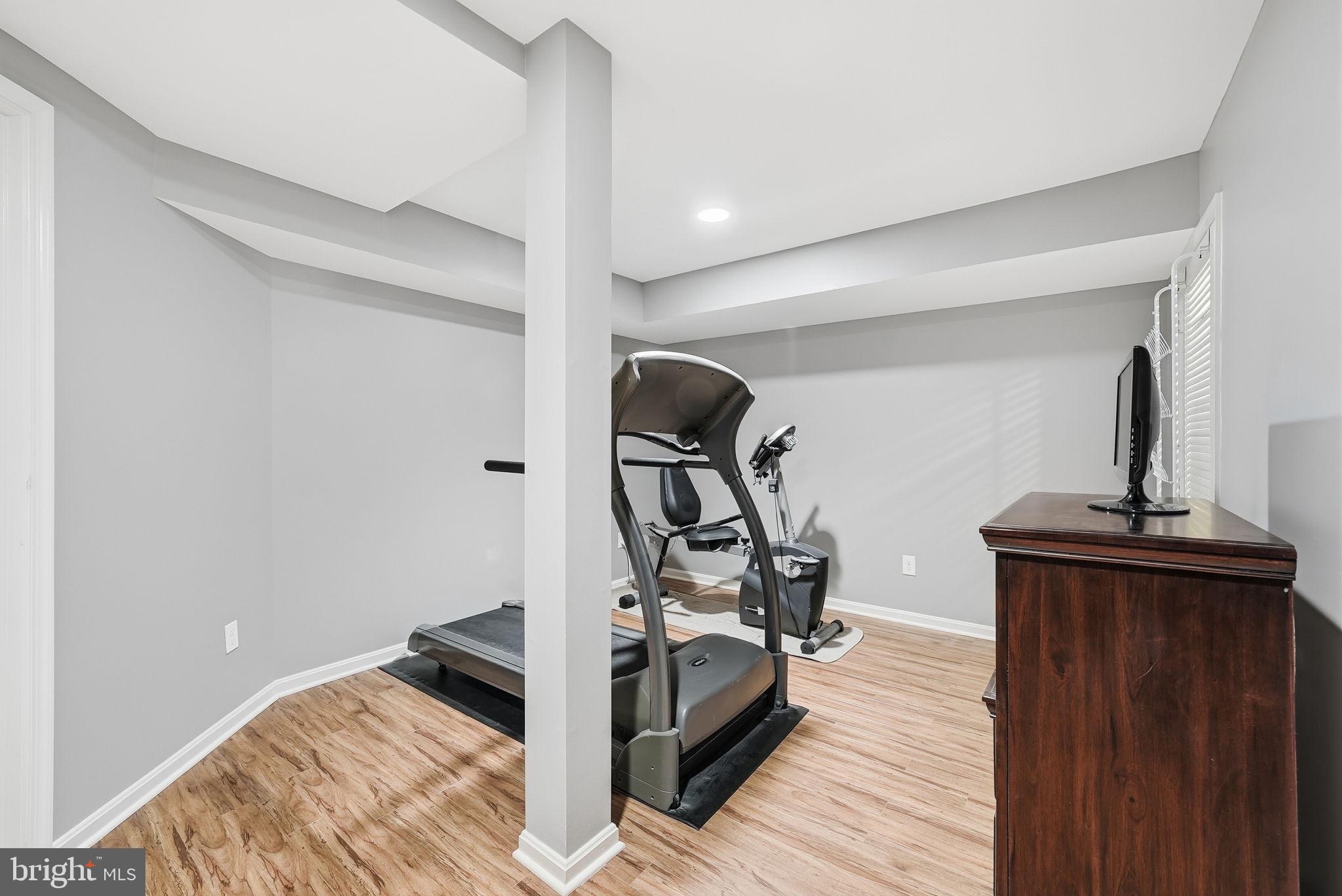 11411 Hollow Timber Court Reston, VA 20194 - Photo 34 of 46 a view of a room with gym equipment