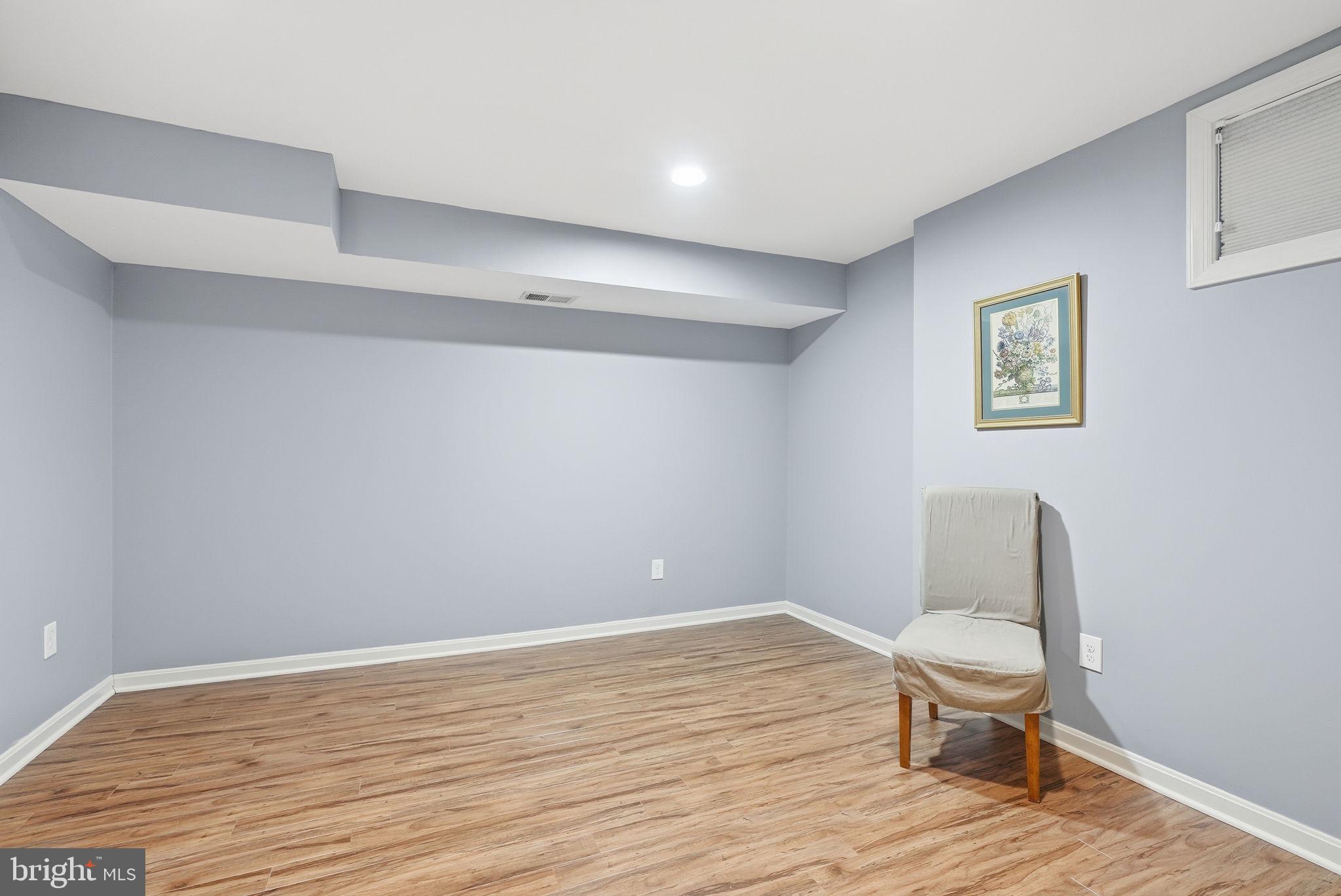 11411 Hollow Timber Court Reston, VA 20194 - Photo 38 of 46 a chair and table in a room