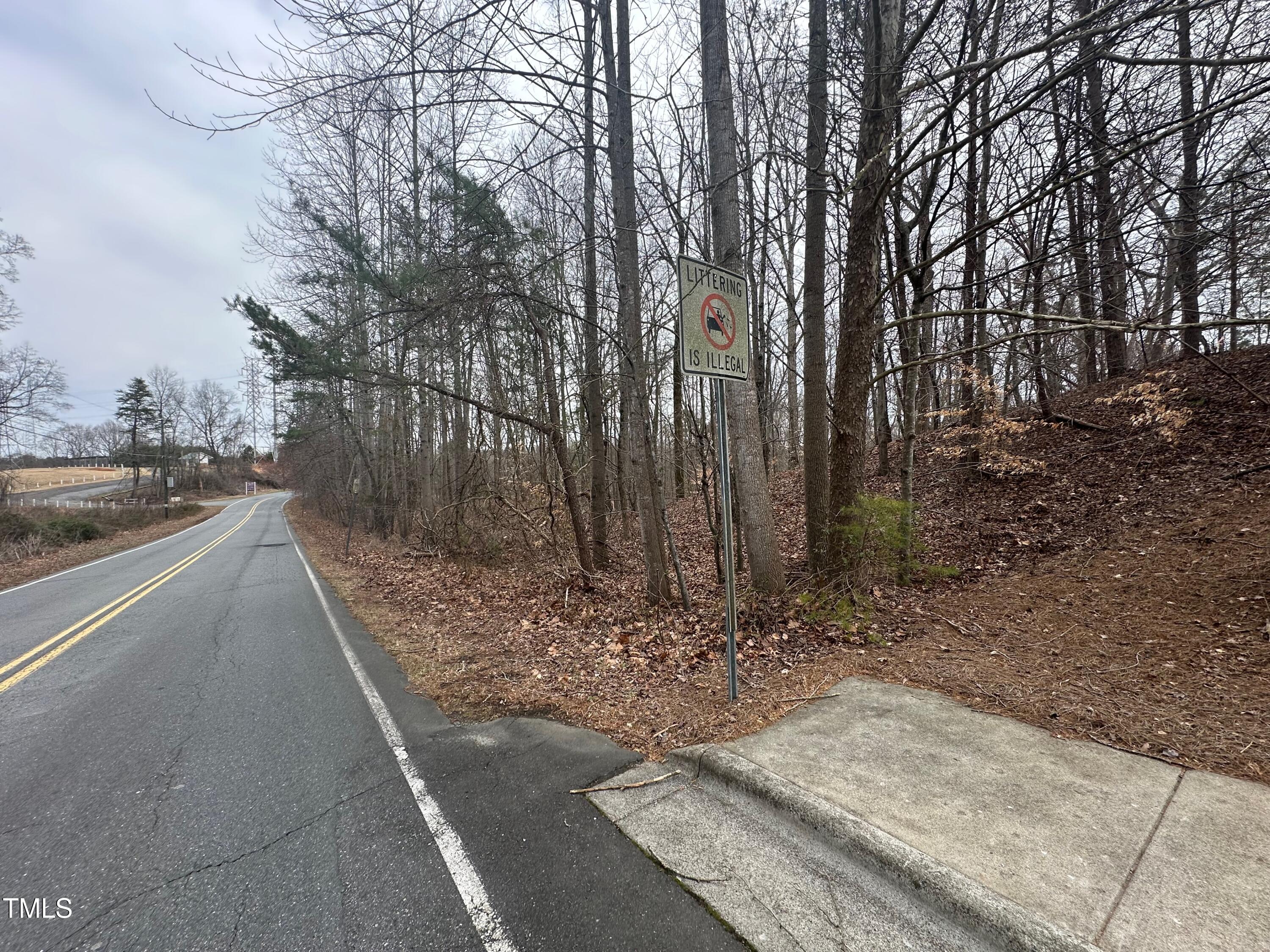 a view of a backyard of the house