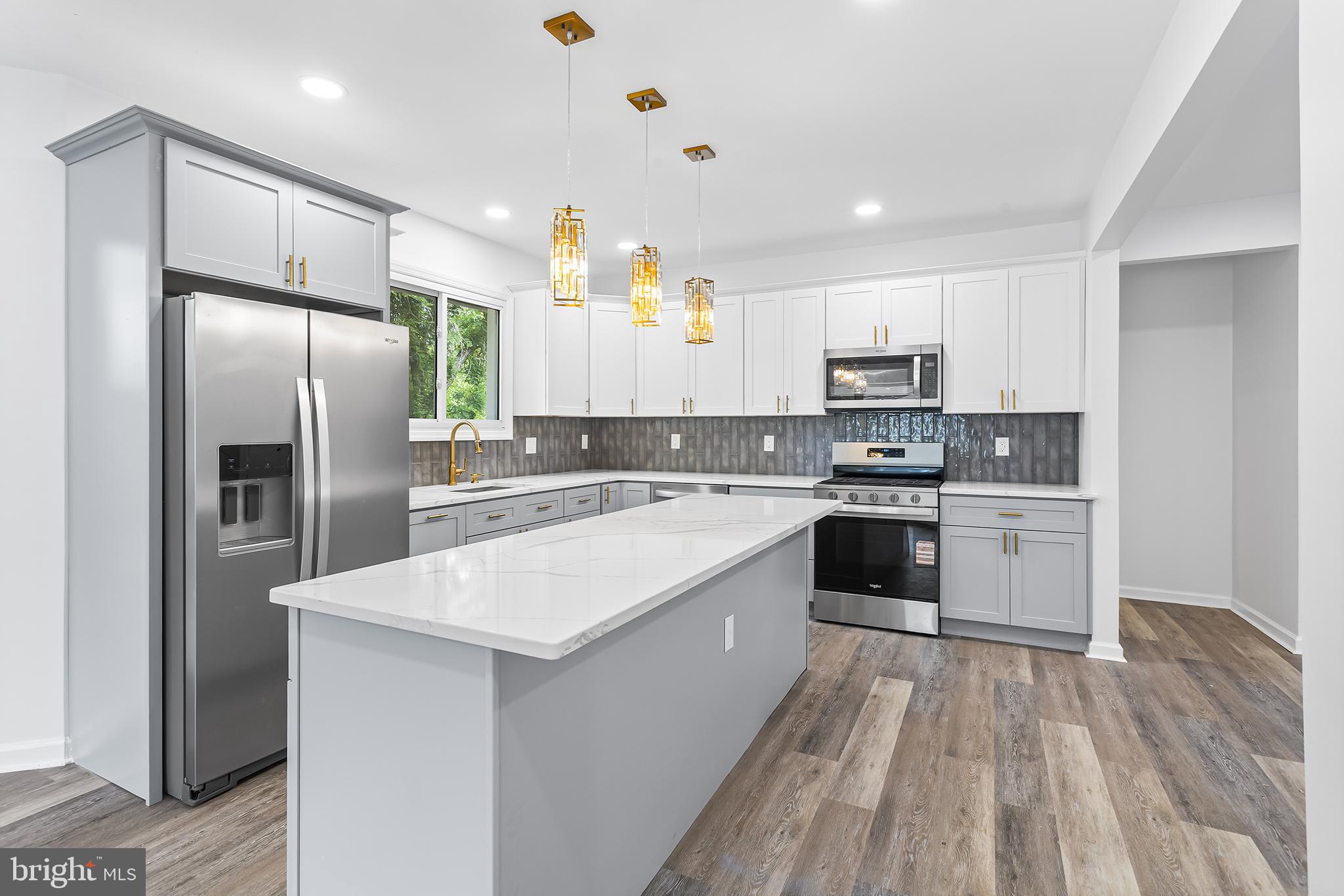 97 Erial Road Clementon, NJ 08021 - Photo 12 of 48 a large kitchen with a sink stainless steel appliances and cabinets