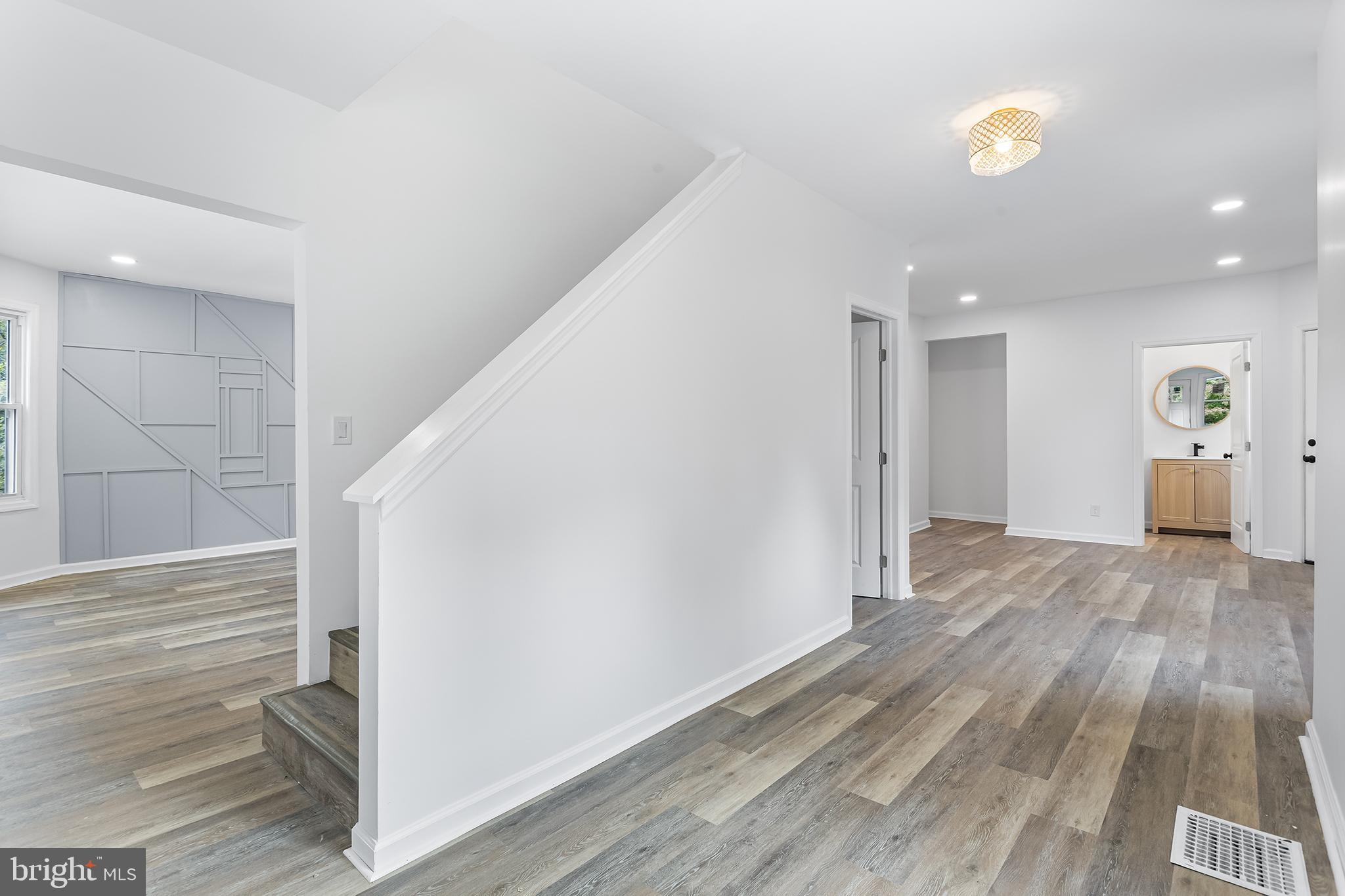 97 Erial Road Clementon, NJ 08021 - Photo 6 of 48 a view of empty room with wooden floor
