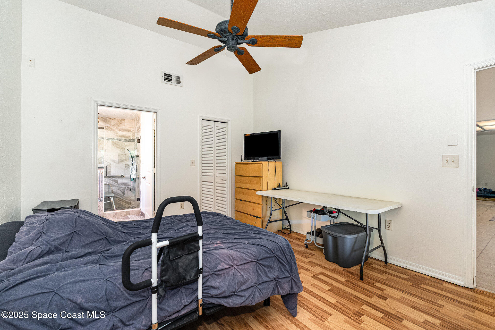 5720 Flint Road Cocoa, FL 32927 - Photo 7 of 26 a view of a workspace with furniture and a window
