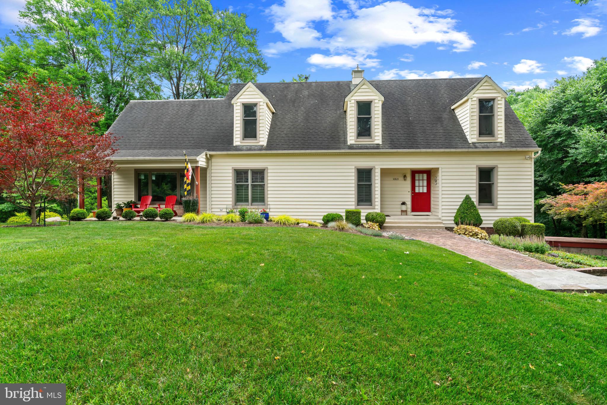 10821 Braeburn Road Columbia, MD 21044 - Photo 3 of 64 a front view of house with yard and green space
