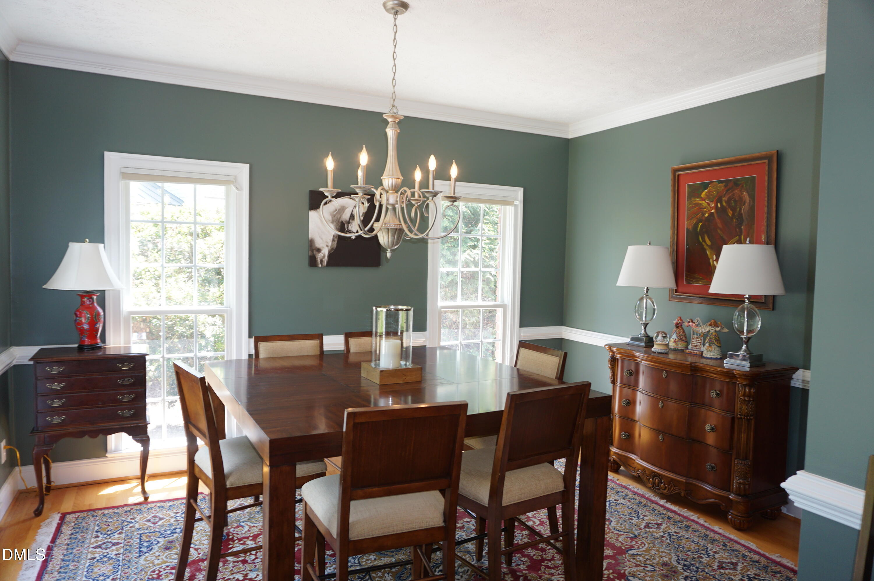 2125 Keith Hills Road Lillington, NC 27546 - Photo 27 of 66 a dining room with furniture a chandelier and window