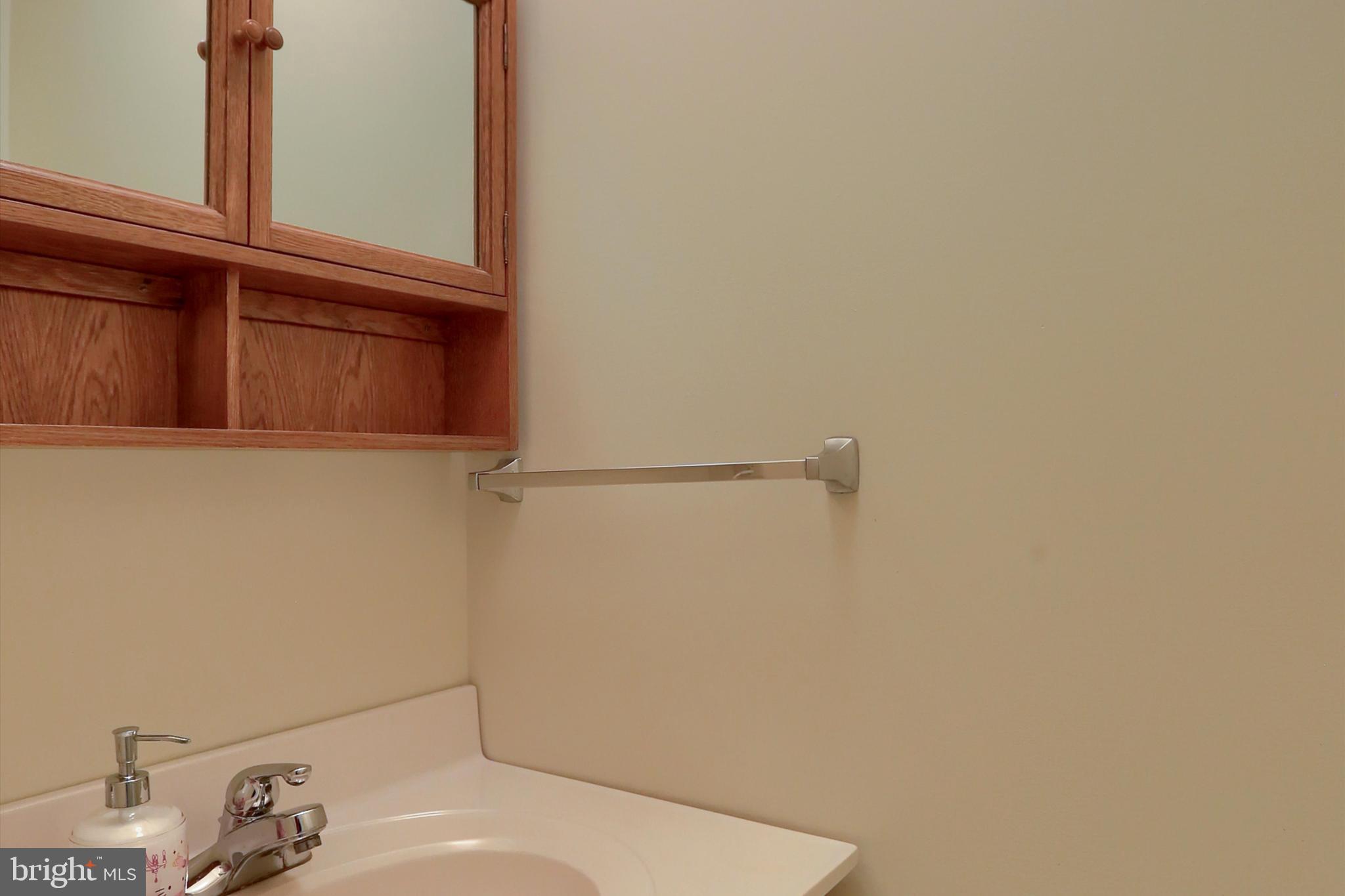 374 Hivner Road Harrisburg, PA 17111 - Photo 11 of 30 Powder room off hallway