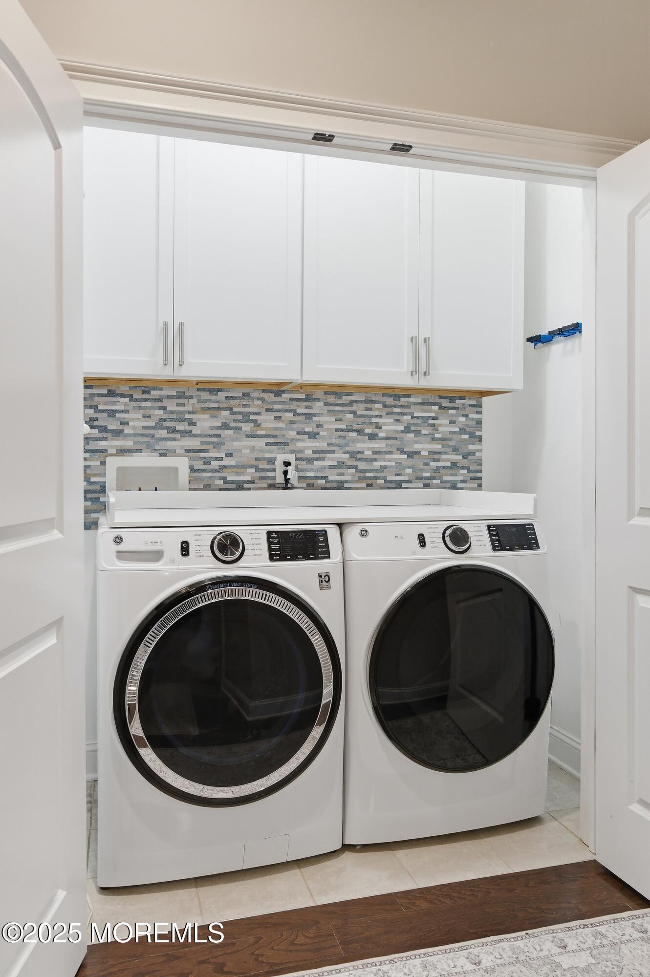 24 Abbey Road Tinton Falls, NJ 07753 - Photo 24 of 52 a utility room with dryer and washer