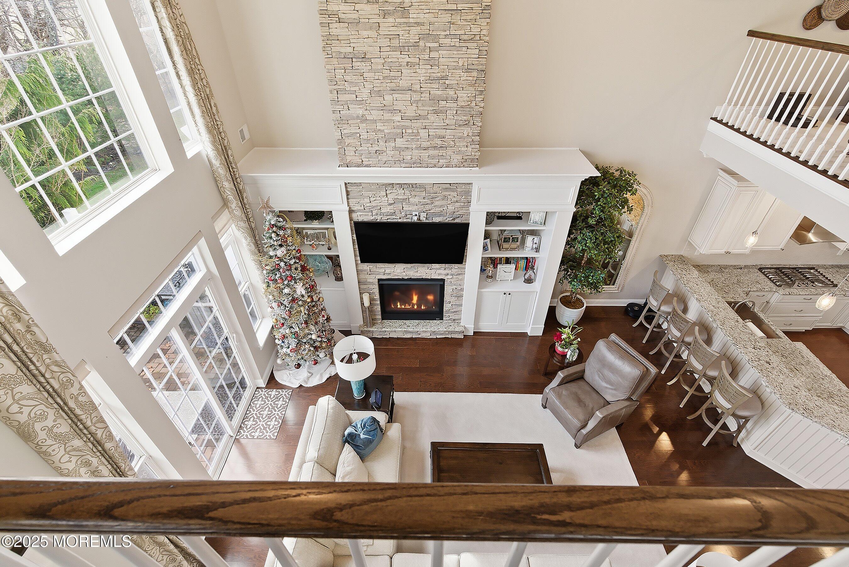 24 Abbey Road Tinton Falls, NJ 07753 - Photo 27 of 52 a view of living room with furniture and a fireplace