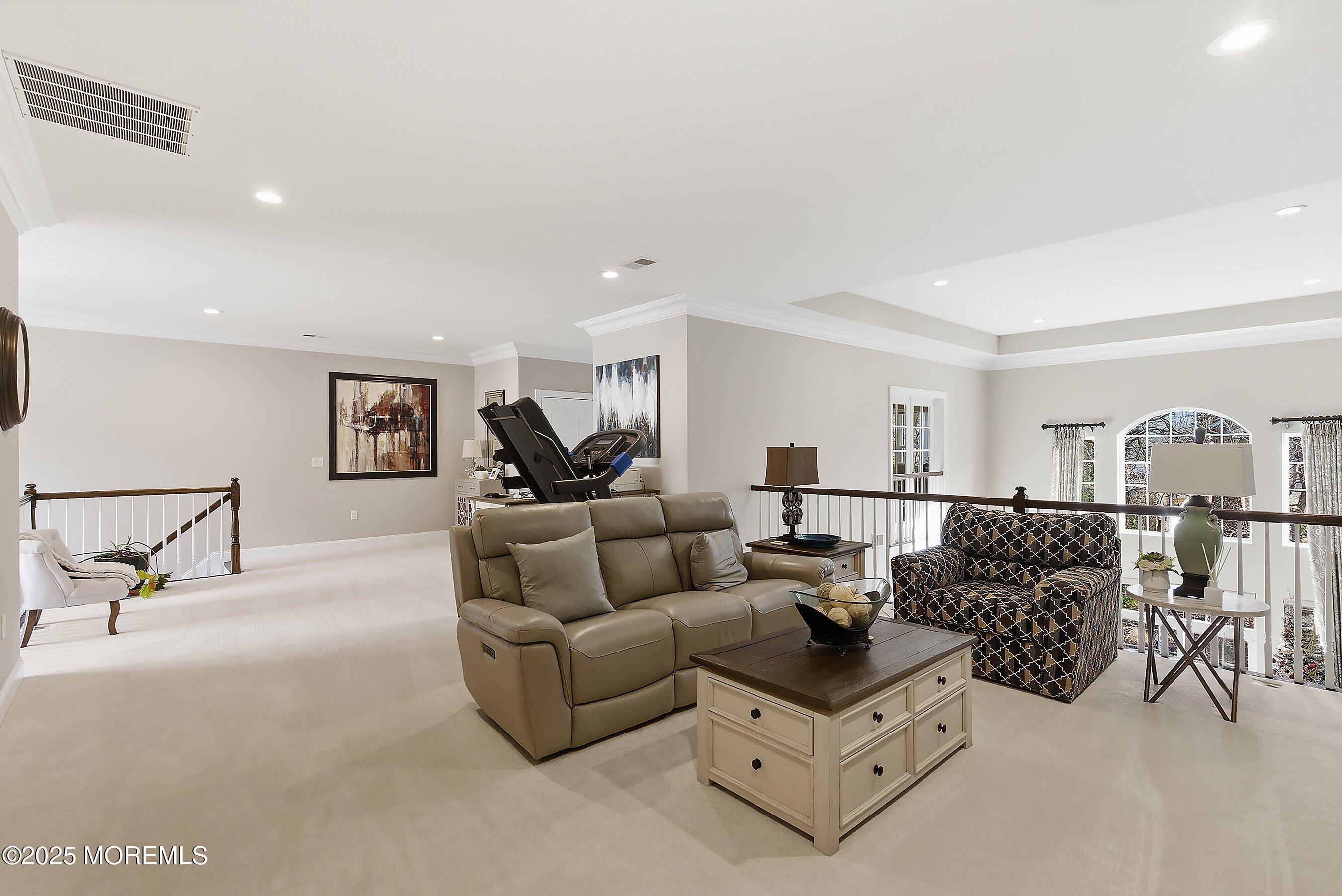 24 Abbey Road Tinton Falls, NJ 07753 - Photo 33 of 52 a living room with furniture and white walls