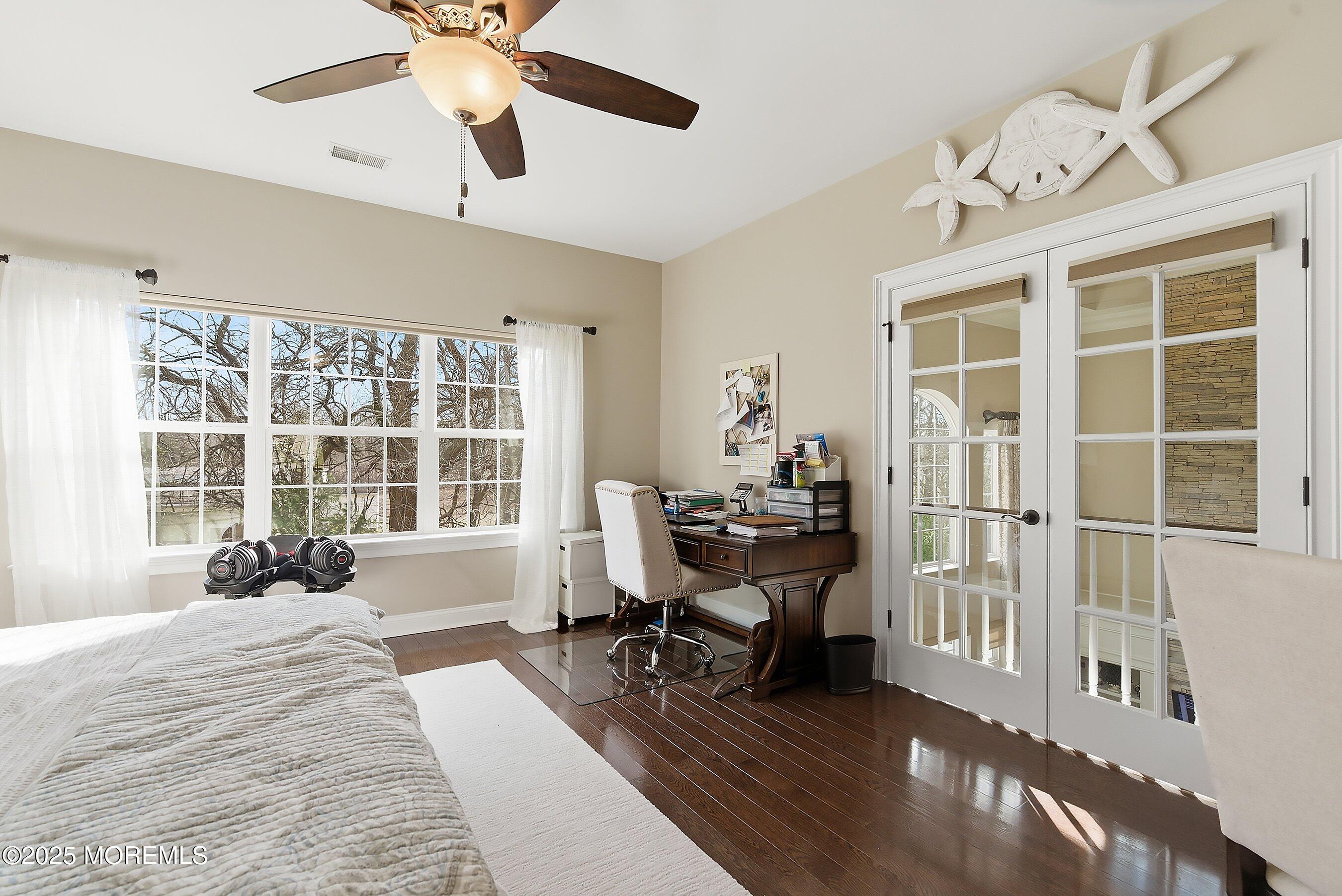 24 Abbey Road Tinton Falls, NJ 07753 - Photo 35 of 52 a view of a workspace with furniture and a window