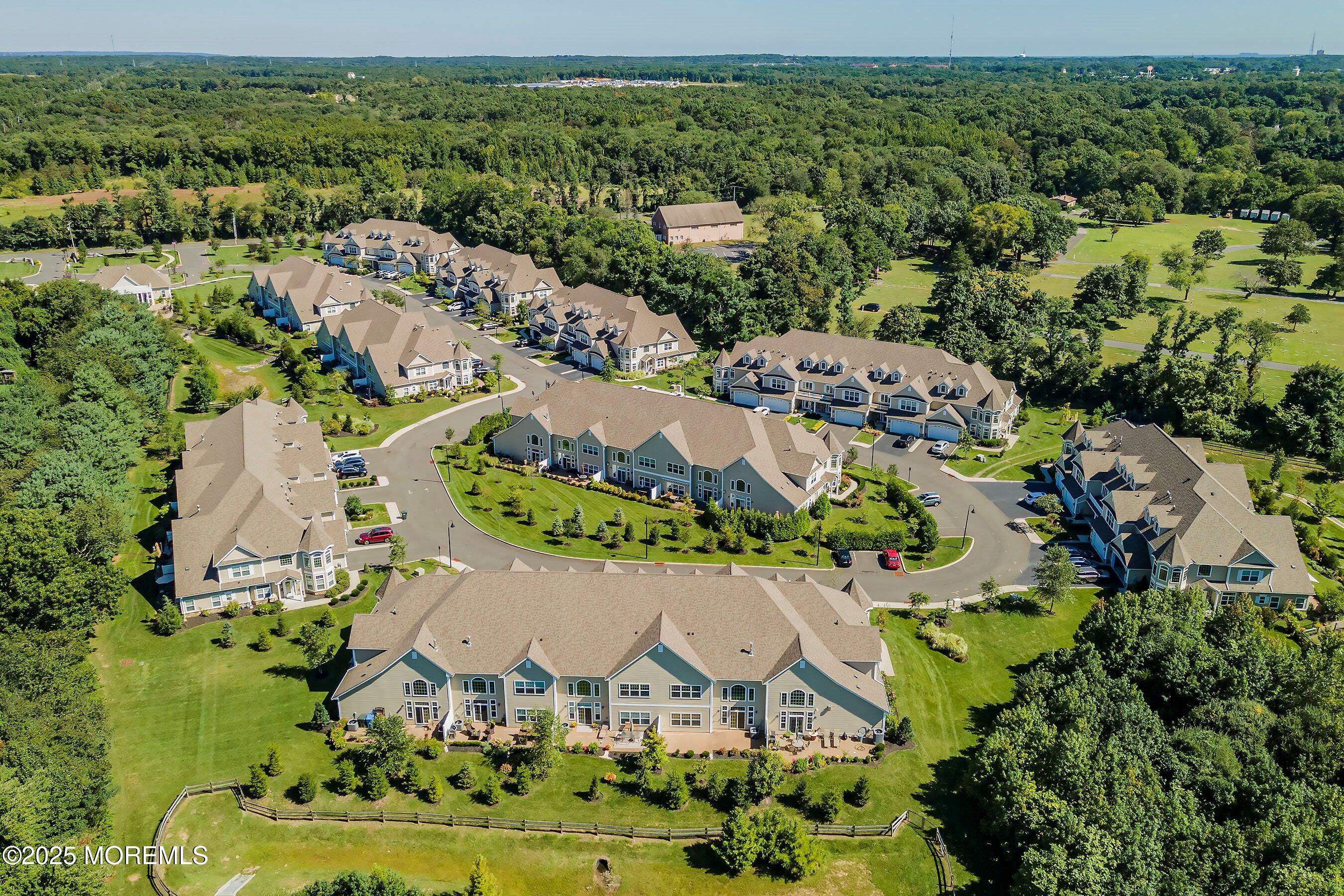 24 Abbey Road Tinton Falls, NJ 07753 - Photo 46 of 52 an aerial view of a