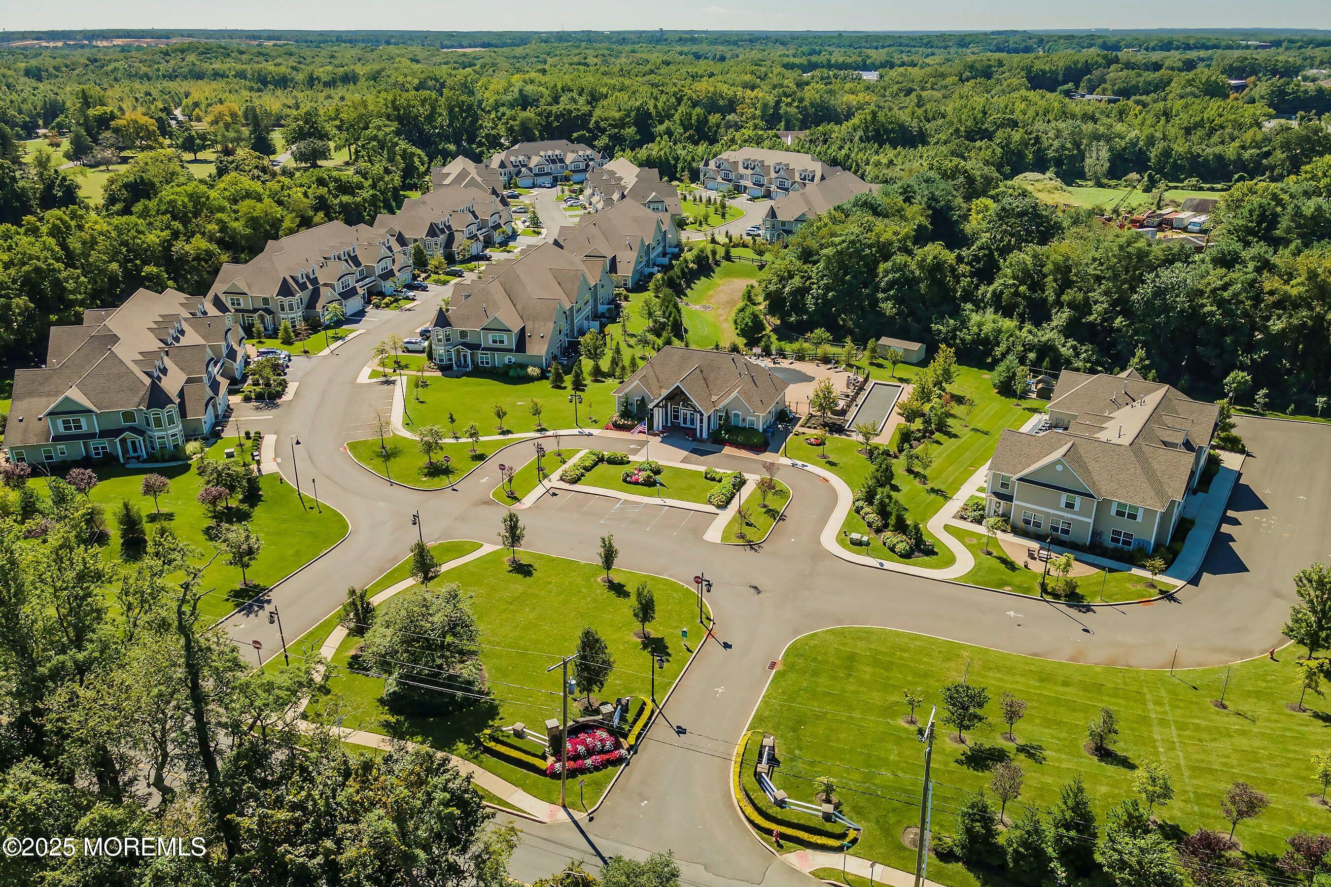 24 Abbey Road Tinton Falls, NJ 07753 - Photo 47 of 52 an aerial view of residential houses with outdoor space