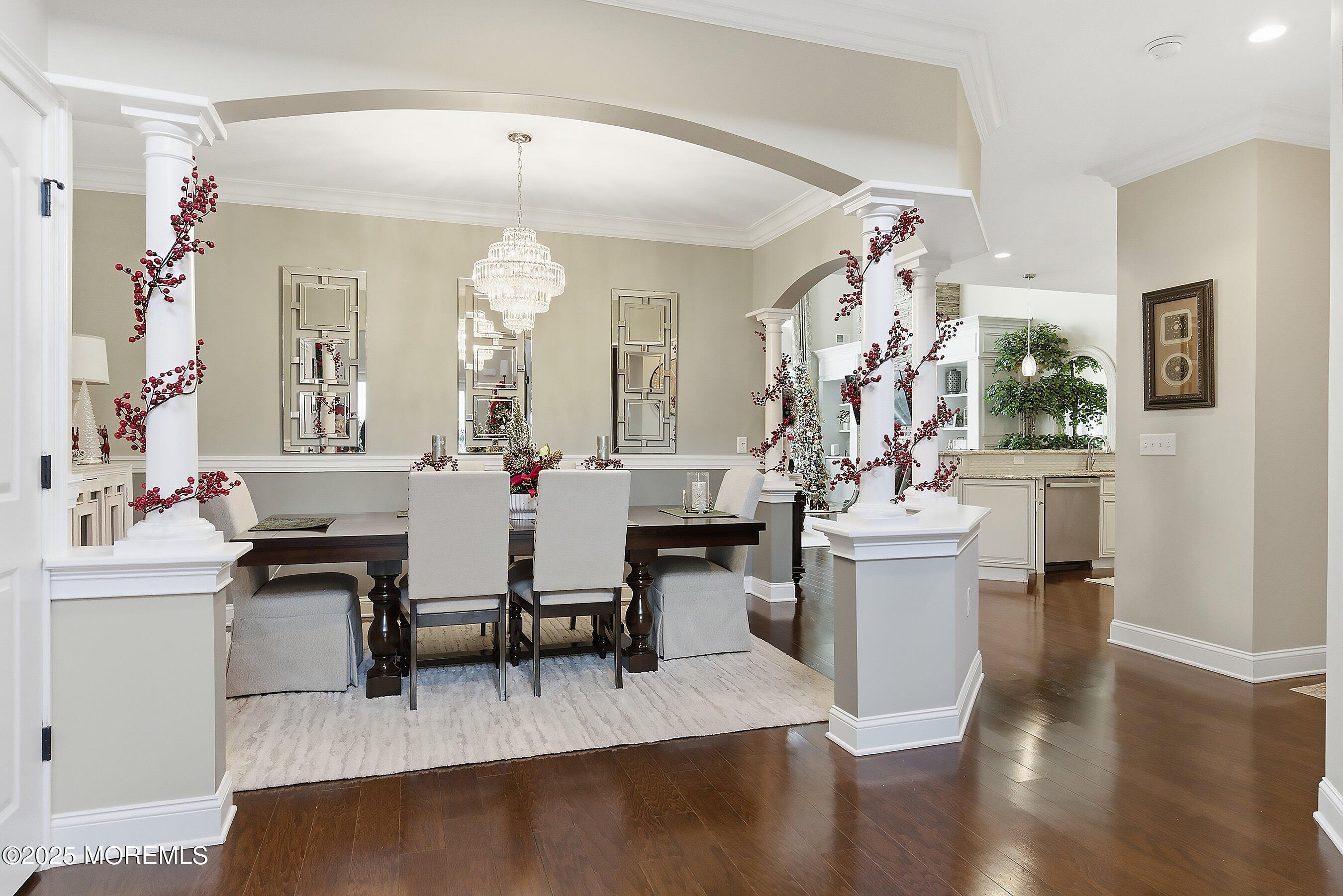 24 Abbey Road Tinton Falls, NJ 07753 - Photo 6 of 52 a view of a dining room with furniture and wooden floor