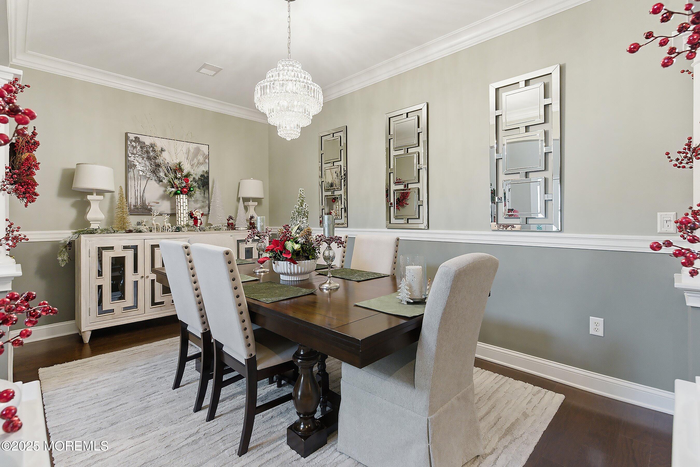 24 Abbey Road Tinton Falls, NJ 07753 - Photo 7 of 52 a view of a dining room with furniture and wooden floor