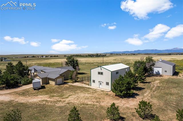 1150 Slocum Road Colorado Springs, CO 80930 - Photo 28 of 30 Birds eye view of property featuring a rural view and a mountain view