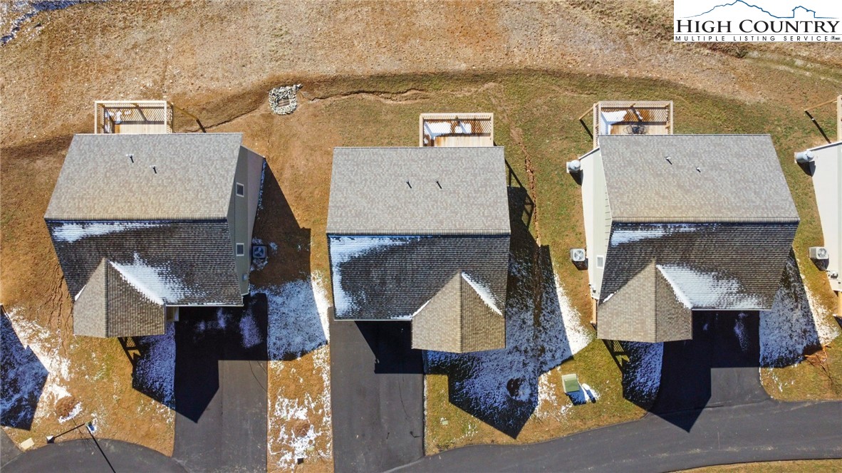233 Ava Way, Unit 109 Boone, NC 28607 - Photo 24 of 26 an aerial view of residential houses with outdoor space
