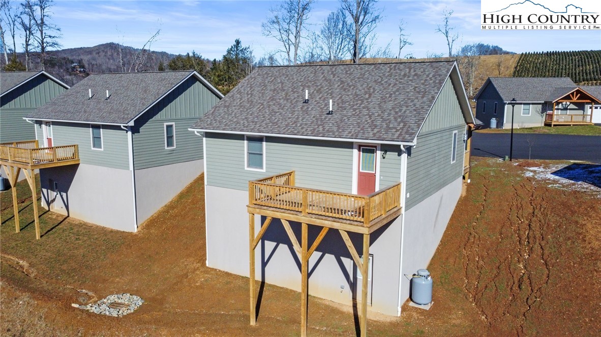 233 Ava Way, Unit 109 Boone, NC 28607 - Photo 7 of 26 a aerial view of a house with table and chairs