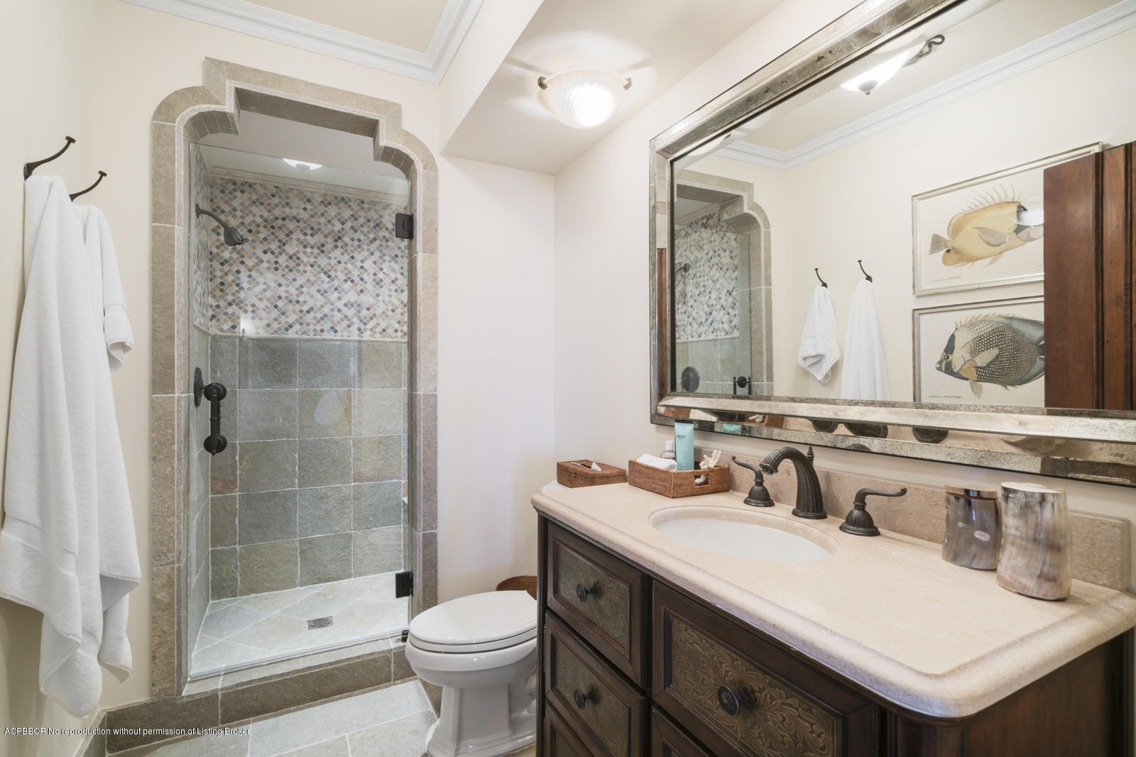 104 Gulfstream Road Palm Beach, FL 33480 - Photo 50 of 60 a bathroom with a sink and a mirror