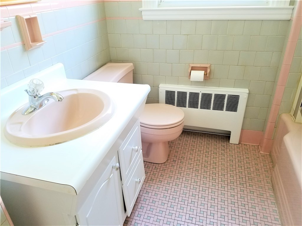 142 Naushon Road Pawtucket, RI 02861 - Photo 9 of 26 Tile in great shape! Has linen closet in and outside of bath.