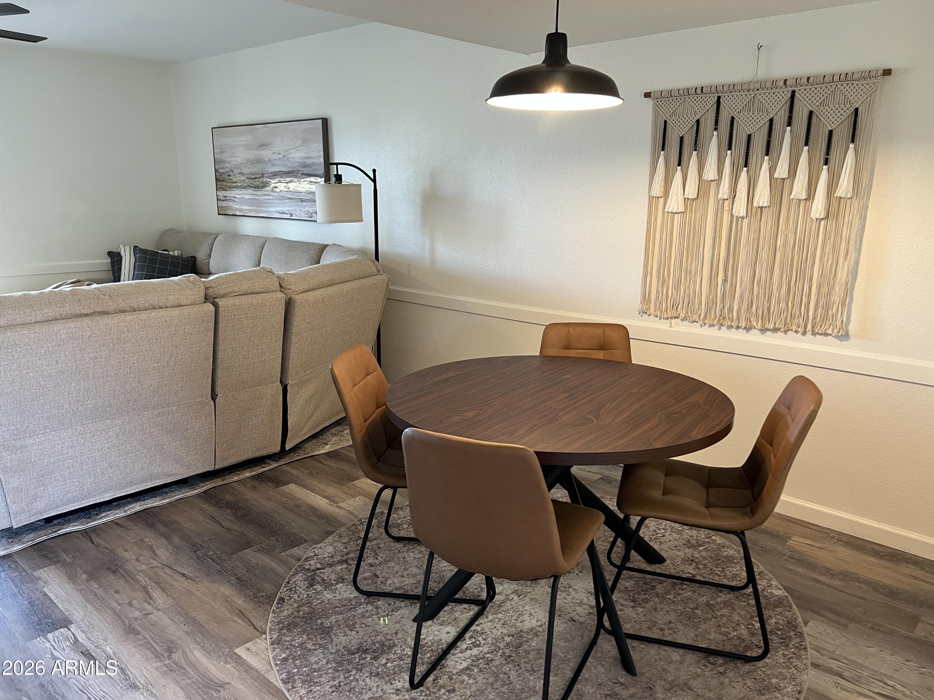617 West 13th Street Tempe, AZ 85281 - Photo 11 of 23 a view of a dining room with furniture and wooden floor