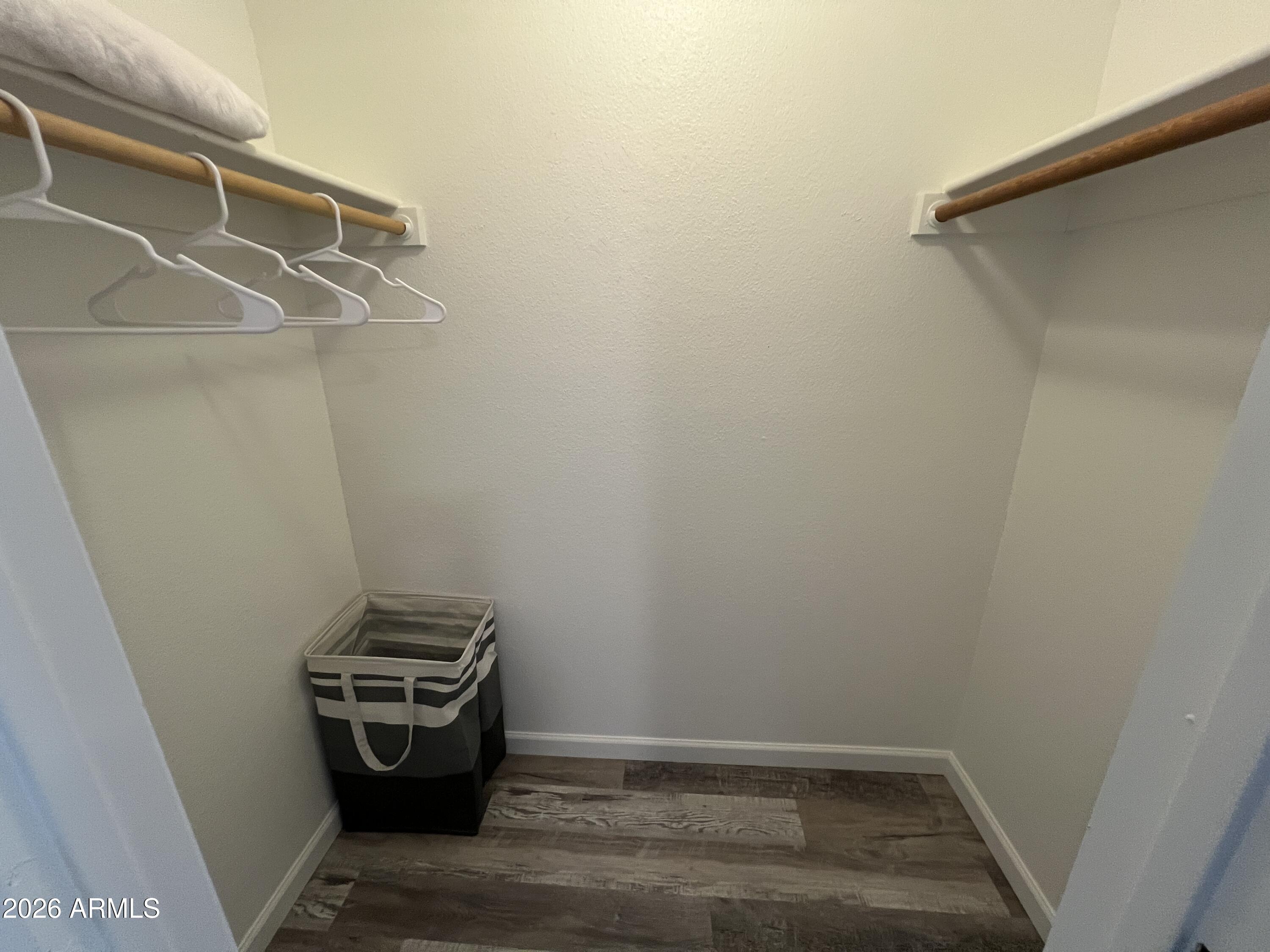 617 West 13th Street Tempe, AZ 85281 - Photo 15 of 23 a view of storage and utility room with racks on the wall