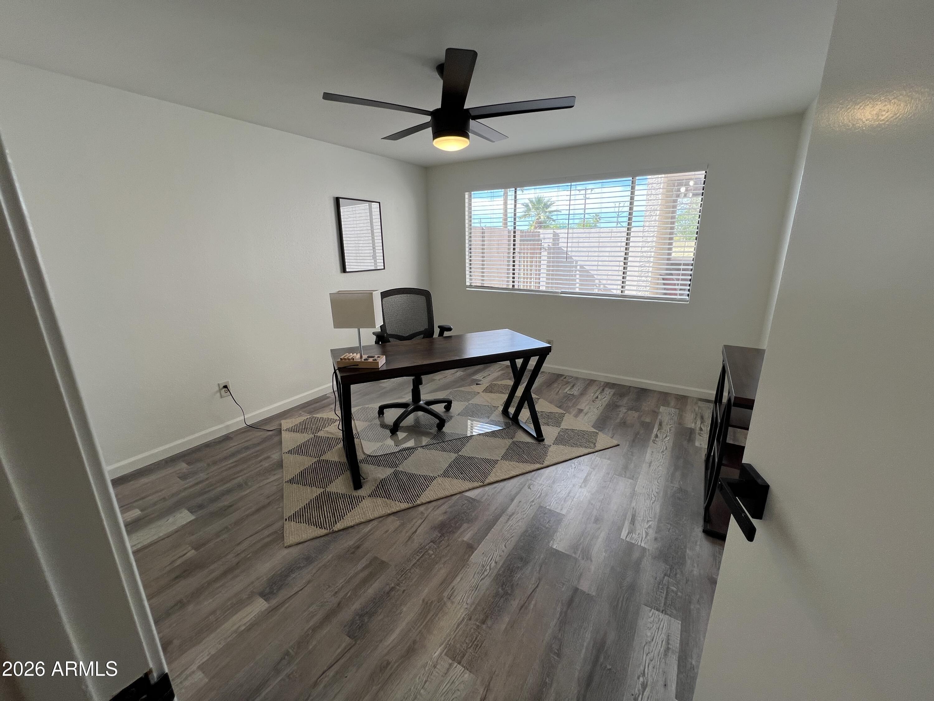 617 West 13th Street Tempe, AZ 85281 - Photo 19 of 23 a workspace with wooden floor