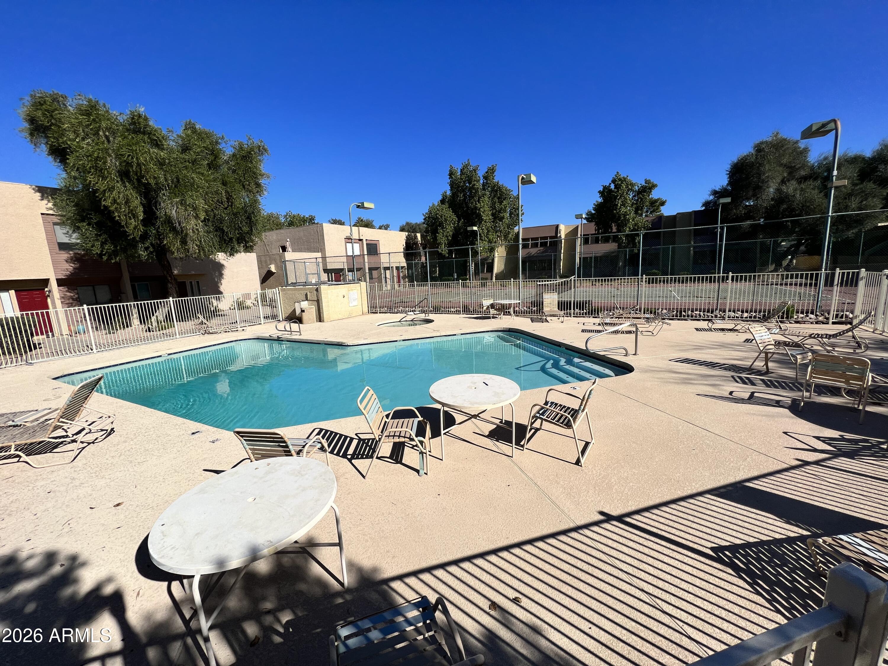 617 West 13th Street Tempe, AZ 85281 - Photo 7 of 23 a view of a swimming pool with lounge chairs