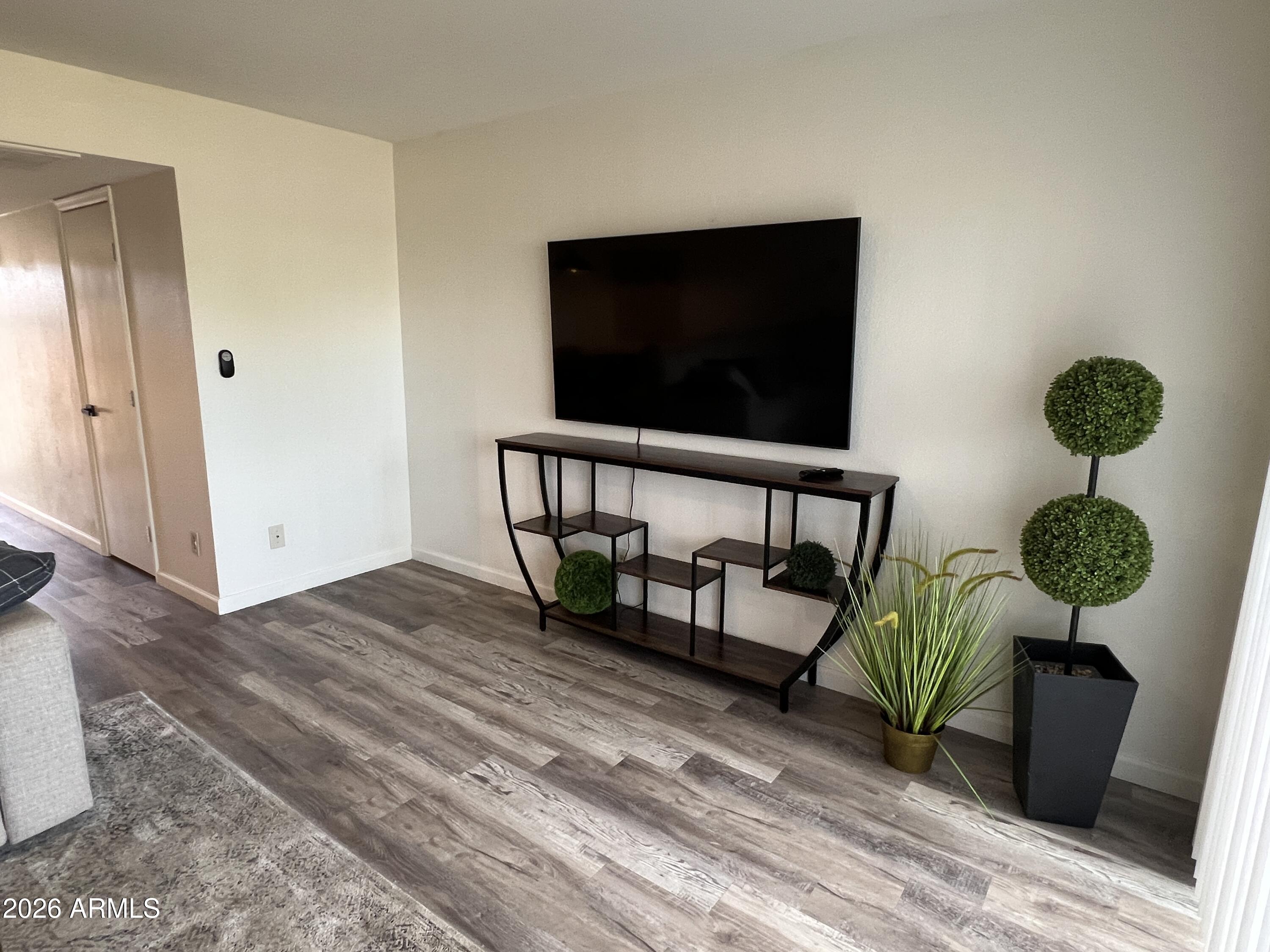 617 West 13th Street Tempe, AZ 85281 - Photo 10 of 23 a living room with furniture and a flat screen tv