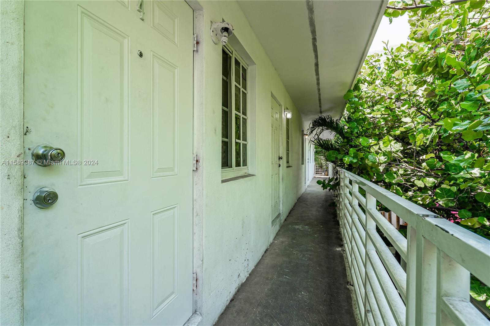 210 Northwest 16th Street Miami, FL 33136 - Photo 11 of 29 a balcony with wooden floor