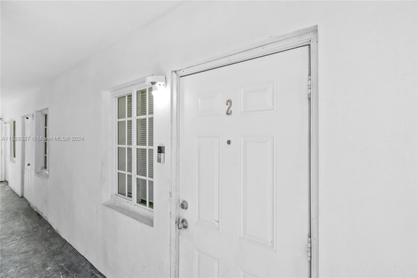 210 Northwest 16th Street Miami, FL 33136 - Photo 14 of 29 a view of front door