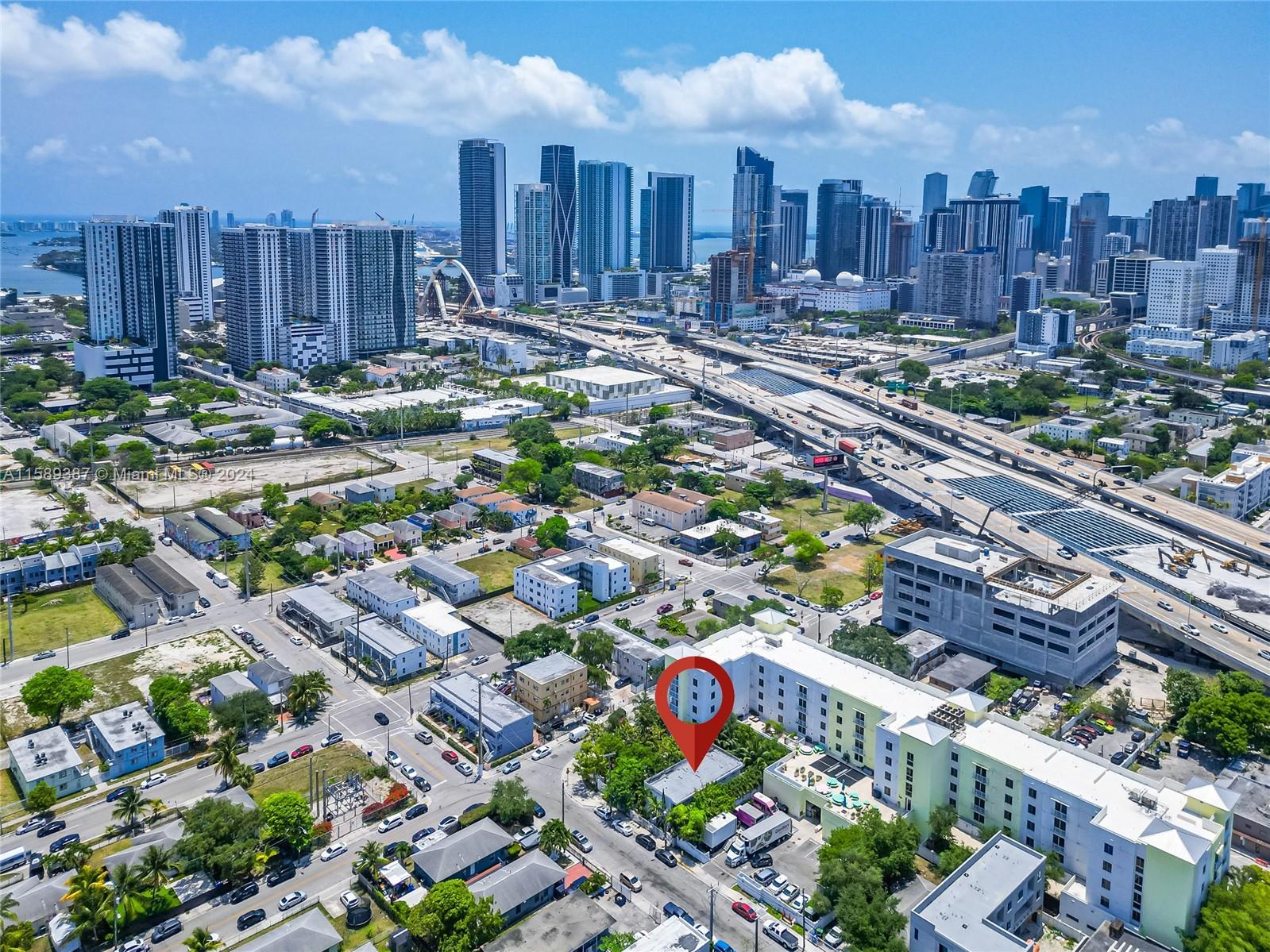 210 Northwest 16th Street Miami, FL 33136 - Photo 3 of 29 a view of a city with tall buildings