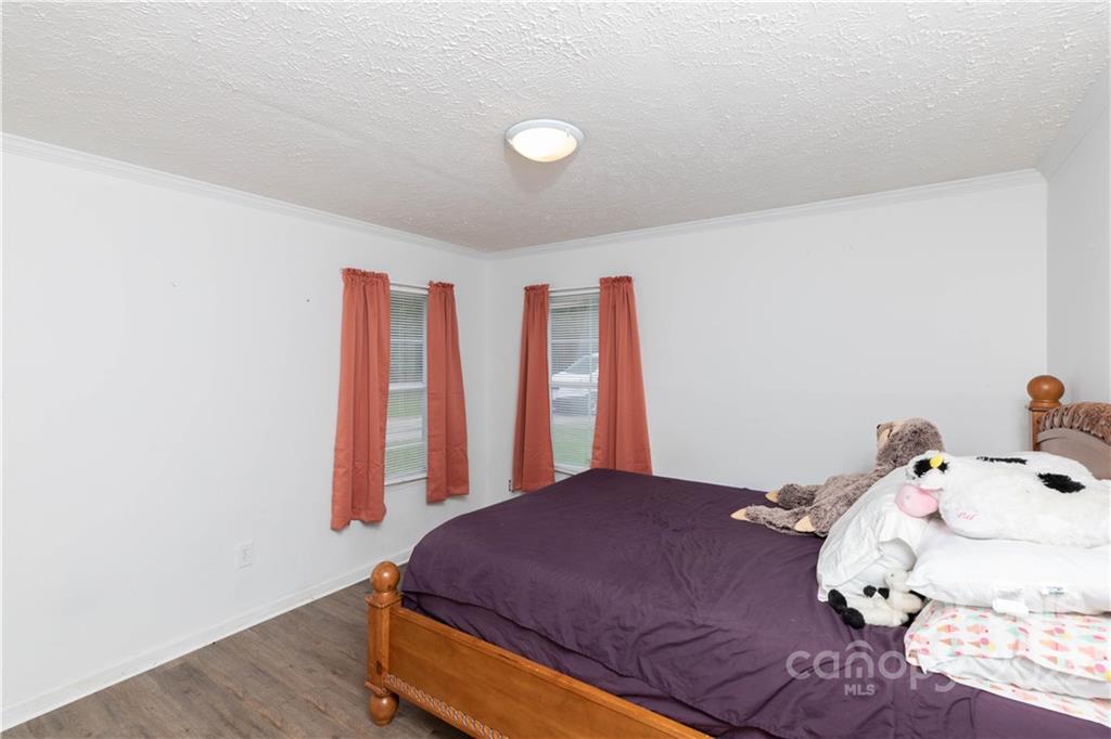 265 Whiteside Road Clover, SC 29710 - Photo 16 of 47 a bedroom with a bed and a window