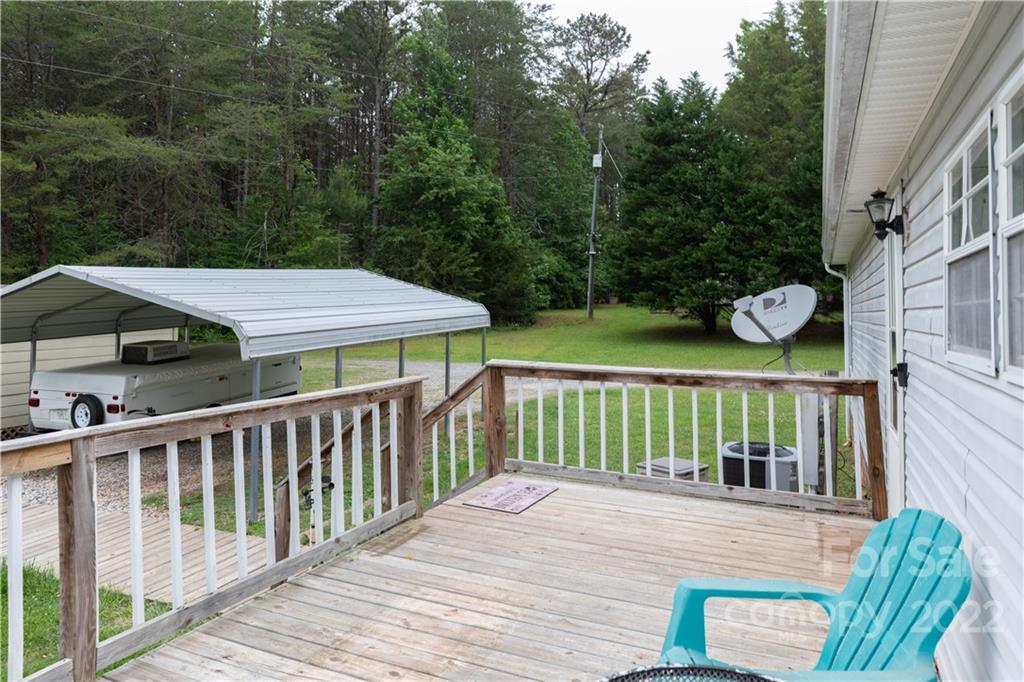 265 Whiteside Road Clover, SC 29710 - Photo 23 of 47 a view of a wooden deck and a backyard