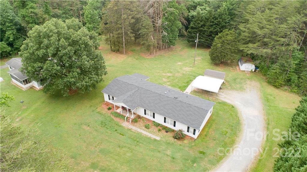 265 Whiteside Road Clover, SC 29710 - Photo 26 of 47 an aerial view of a house with a yard swimming pool and outdoor seating