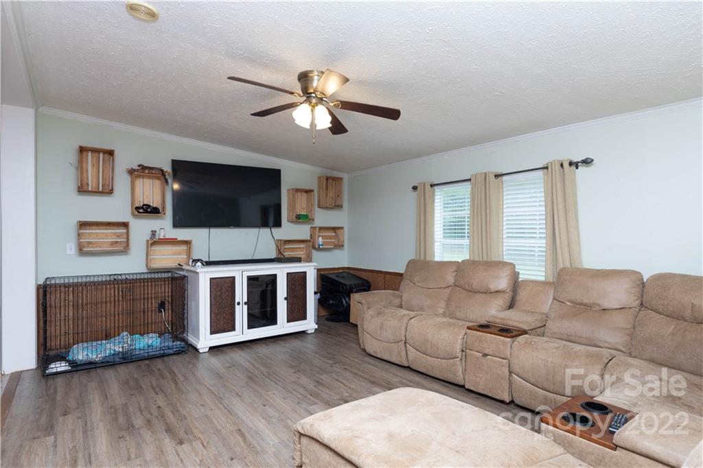 265 Whiteside Road Clover, SC 29710 - Photo 3 of 47 a living room with furniture and a flat screen tv