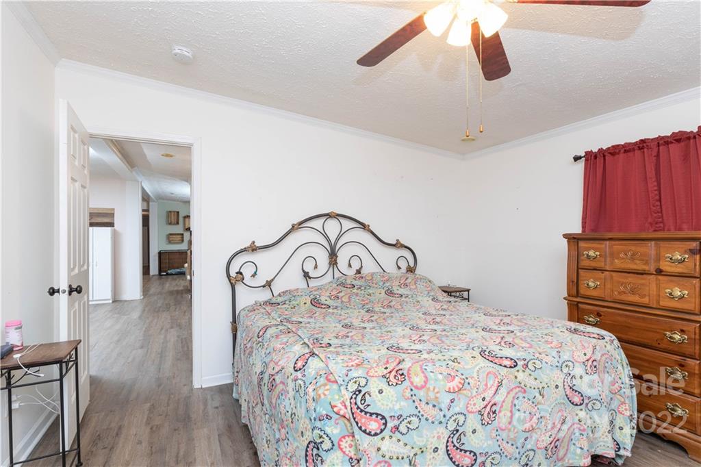 265 Whiteside Road Clover, SC 29710 - Photo 10 of 47 a bedroom with a bed and a dresser