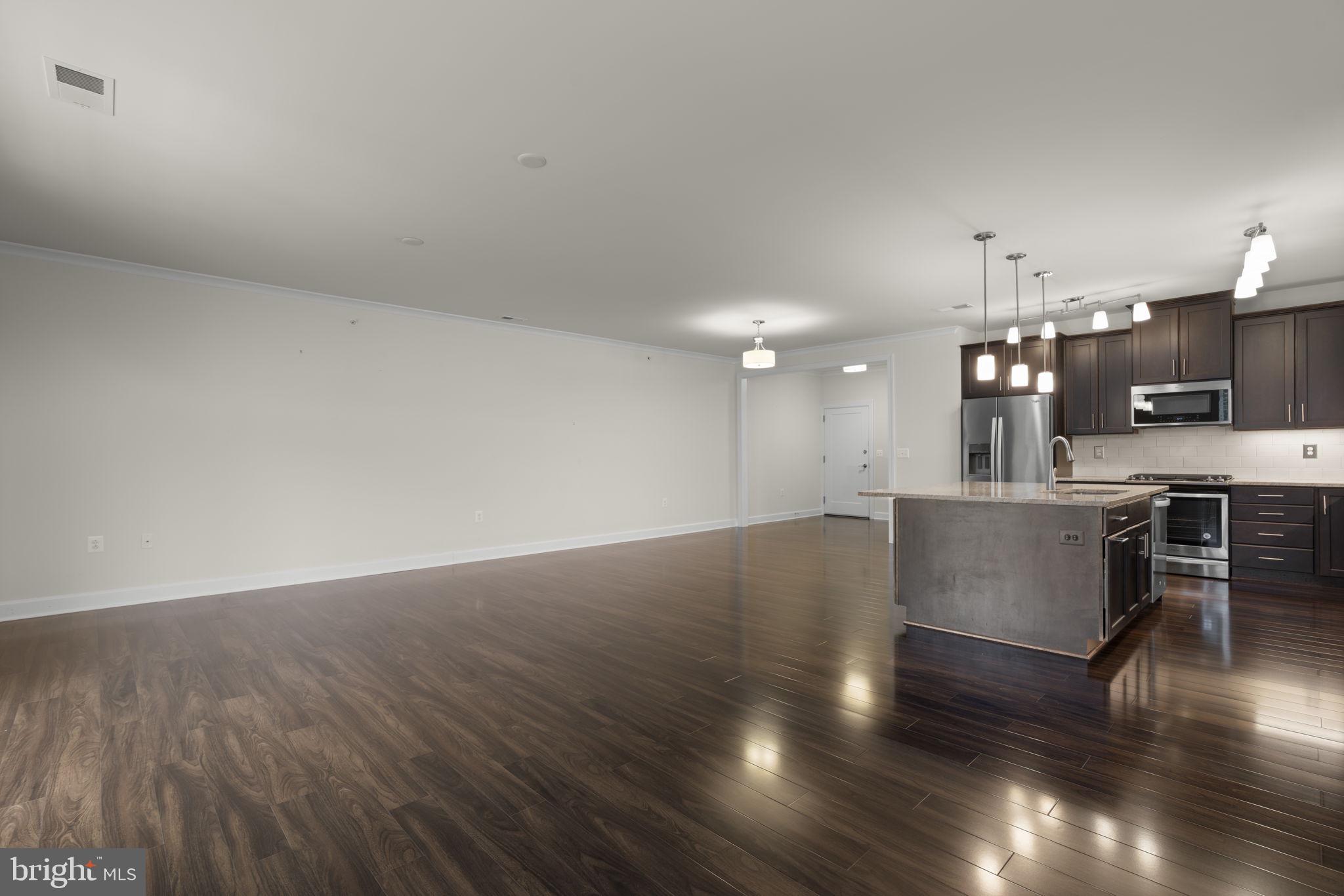 10520 Resort Road, Unit 309 Ellicott City, MD 21042 - Photo 9 of 44 Living / Dining / Kitchen