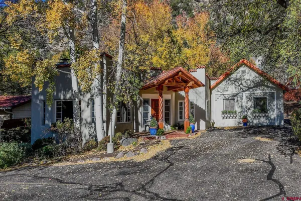 a view of a parked cars in front of a building