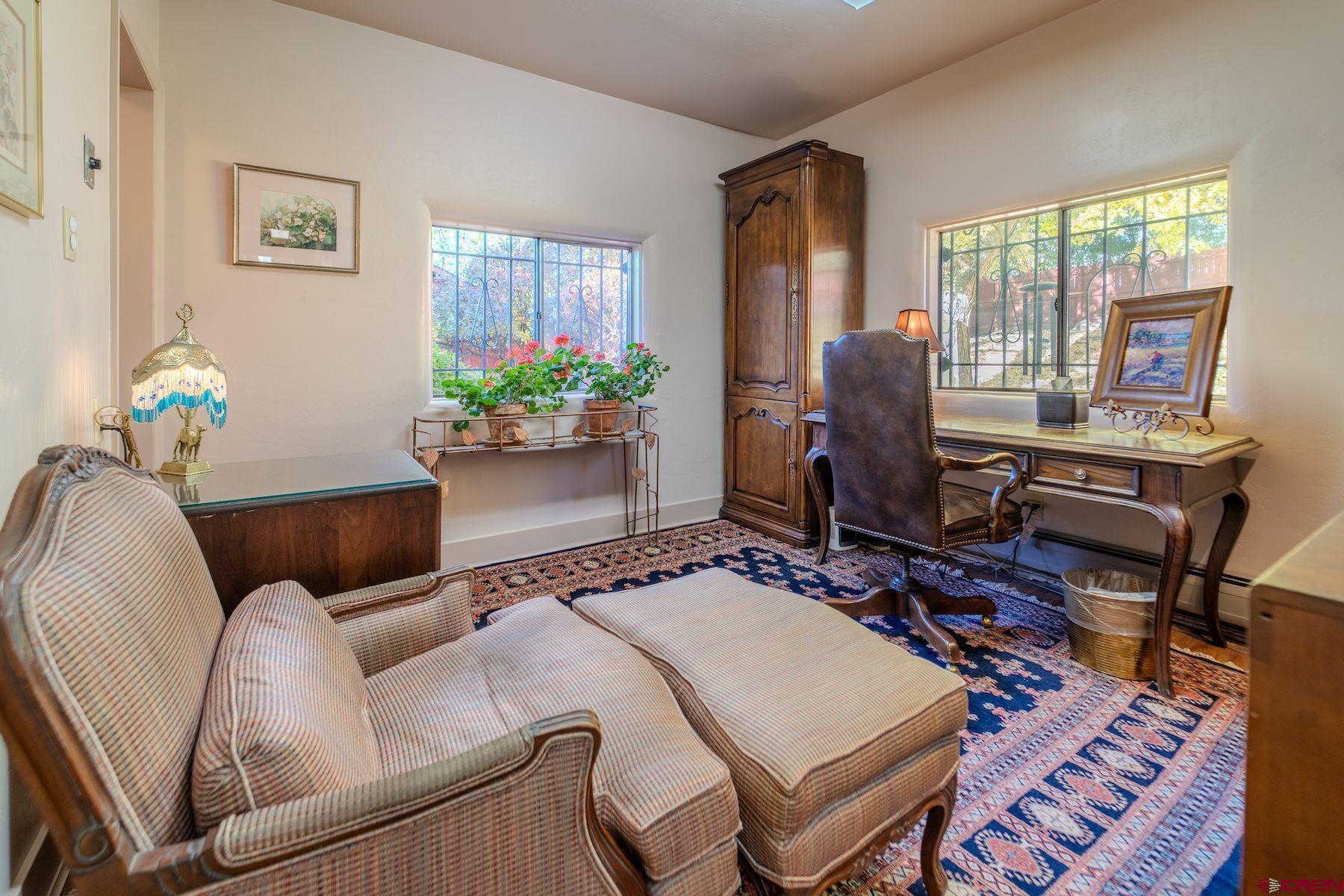 3649 Main Avenue Durango, CO 81301 - Photo 12 of 30 a living room with furniture and a potted plant