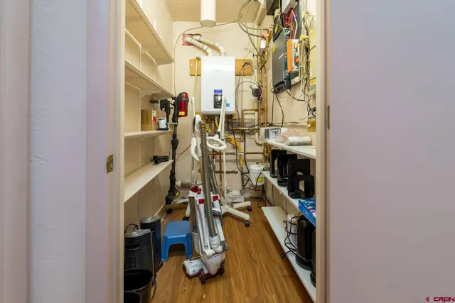 a view of a livingroom with wooden floor