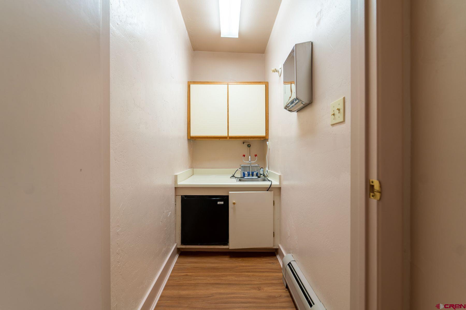 3649 Main Avenue Durango, CO 81301 - Photo 19 of 30 a bathroom with a sink and a mirror