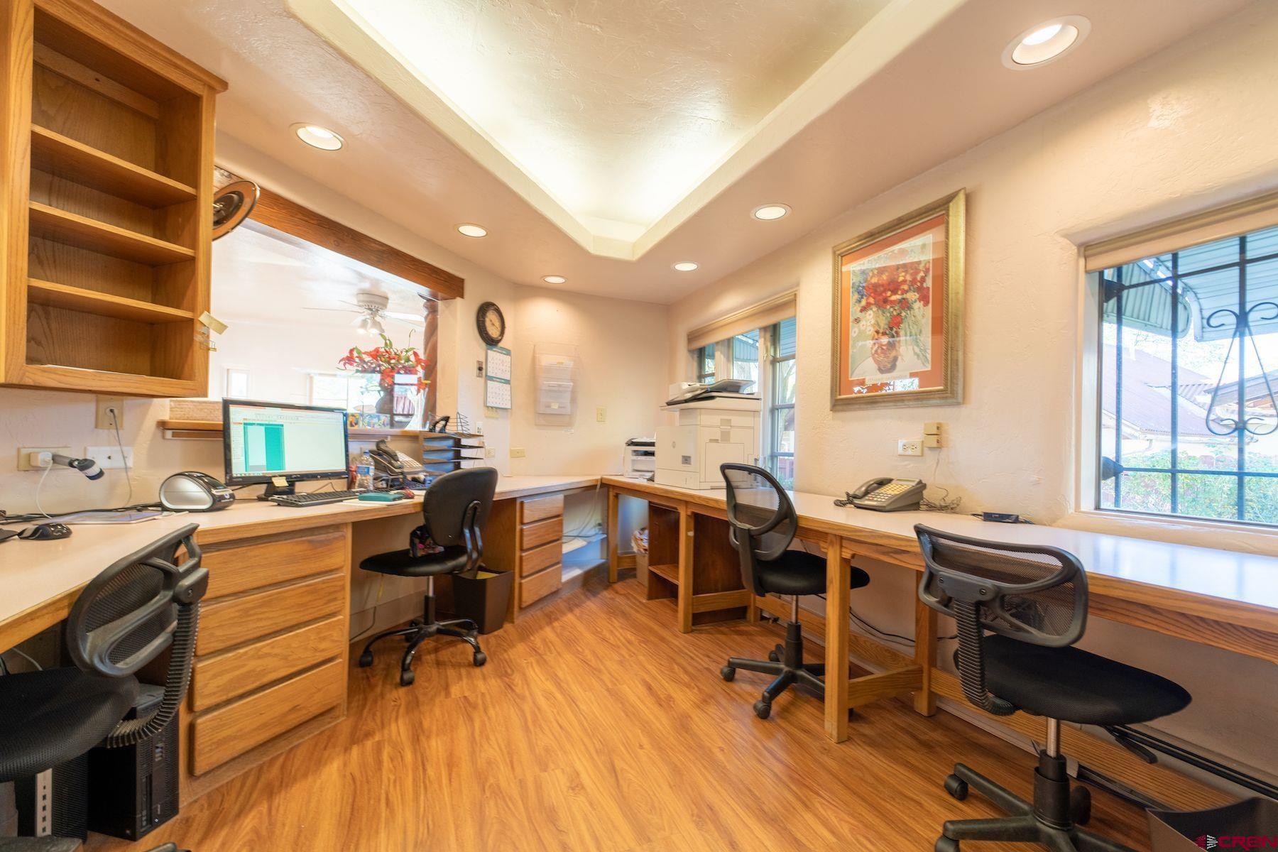 3649 Main Avenue Durango, CO 81301 - Photo 9 of 30 a view of a workspace with furniture and a window