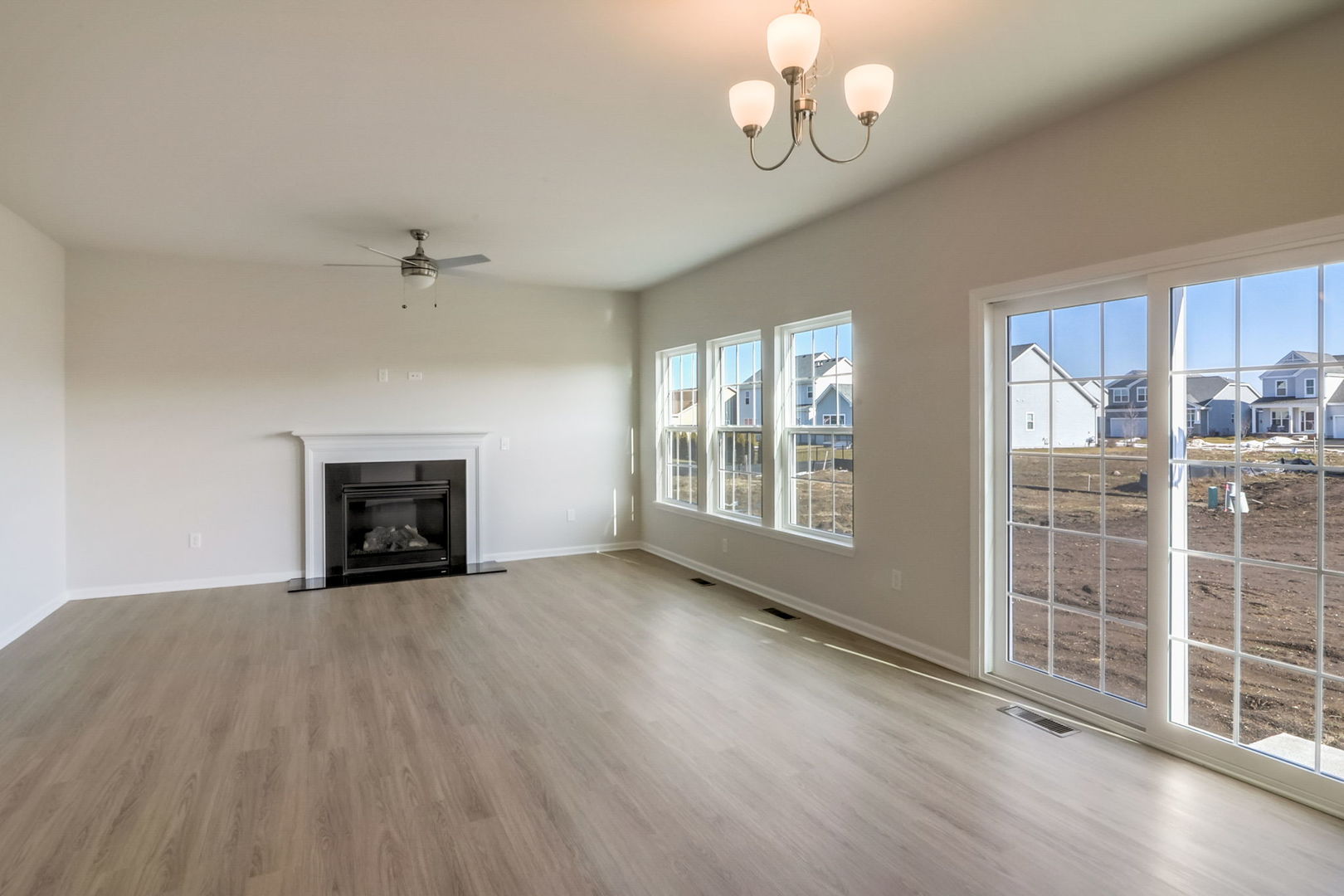 715 Maplewood Circle Elburn, IL 60119 - Photo 13 of 32 an empty room with windows