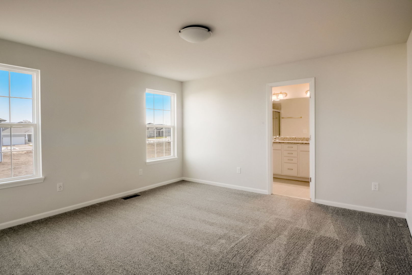 715 Maplewood Circle Elburn, IL 60119 - Photo 20 of 32 an empty room with windows and closet