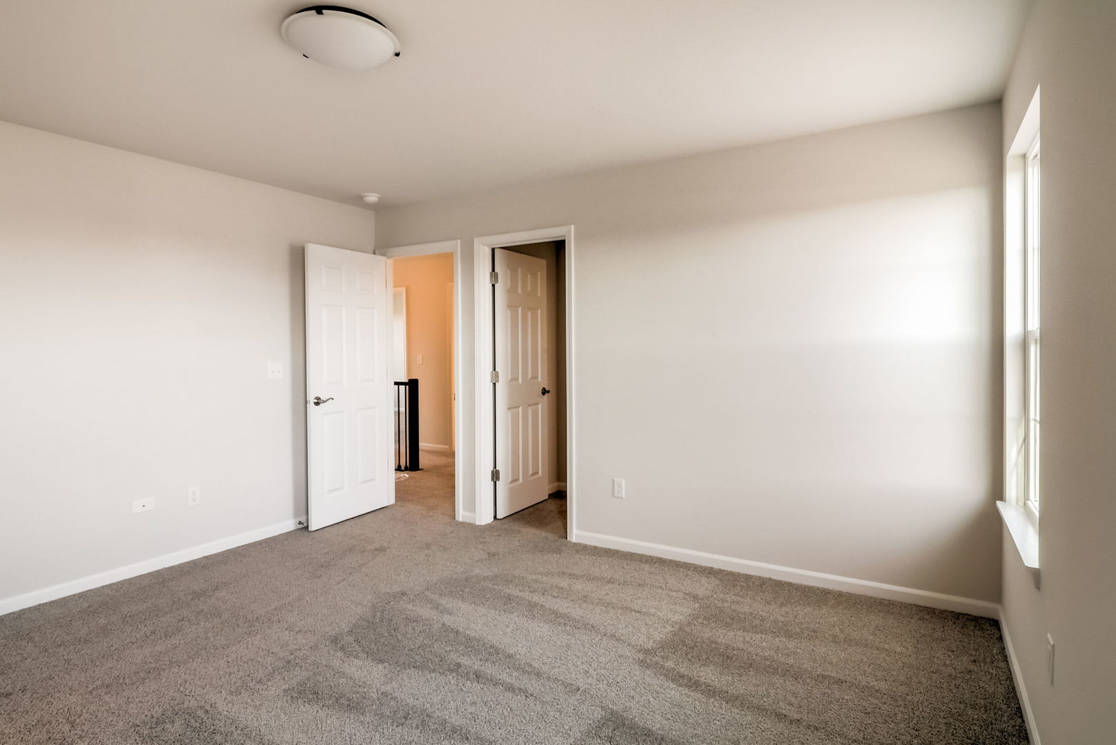 715 Maplewood Circle Elburn, IL 60119 - Photo 23 of 32 a view of hallway with chandelier