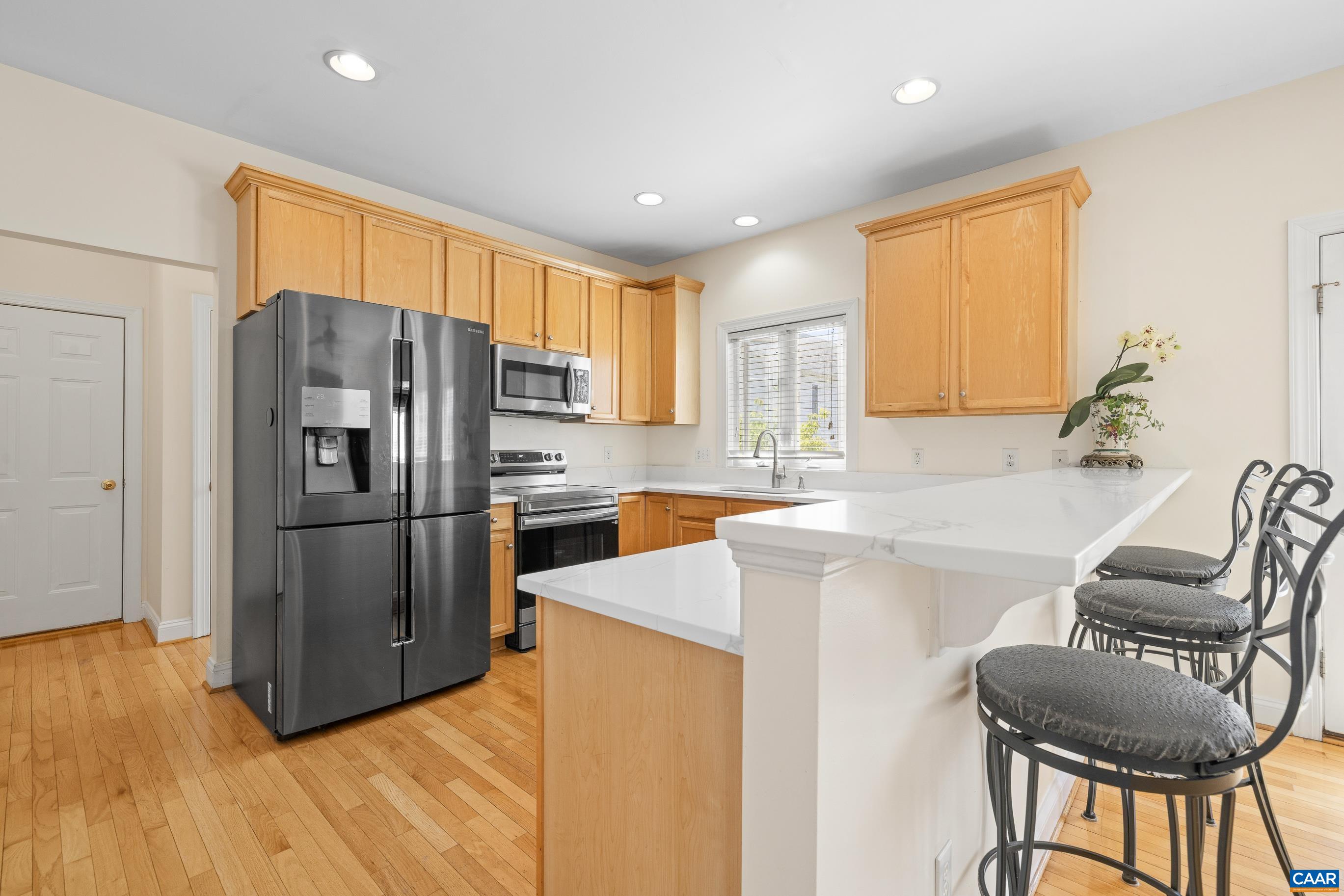 1236 Amber Ridge Road Charlottesville, VA 22901 - Photo 16 of 56 a kitchen with stainless steel appliances a refrigerator and a stove