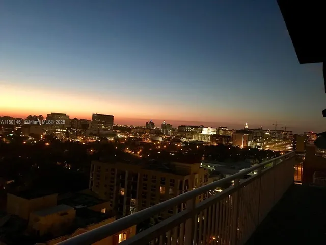 a view of a balcony with city view