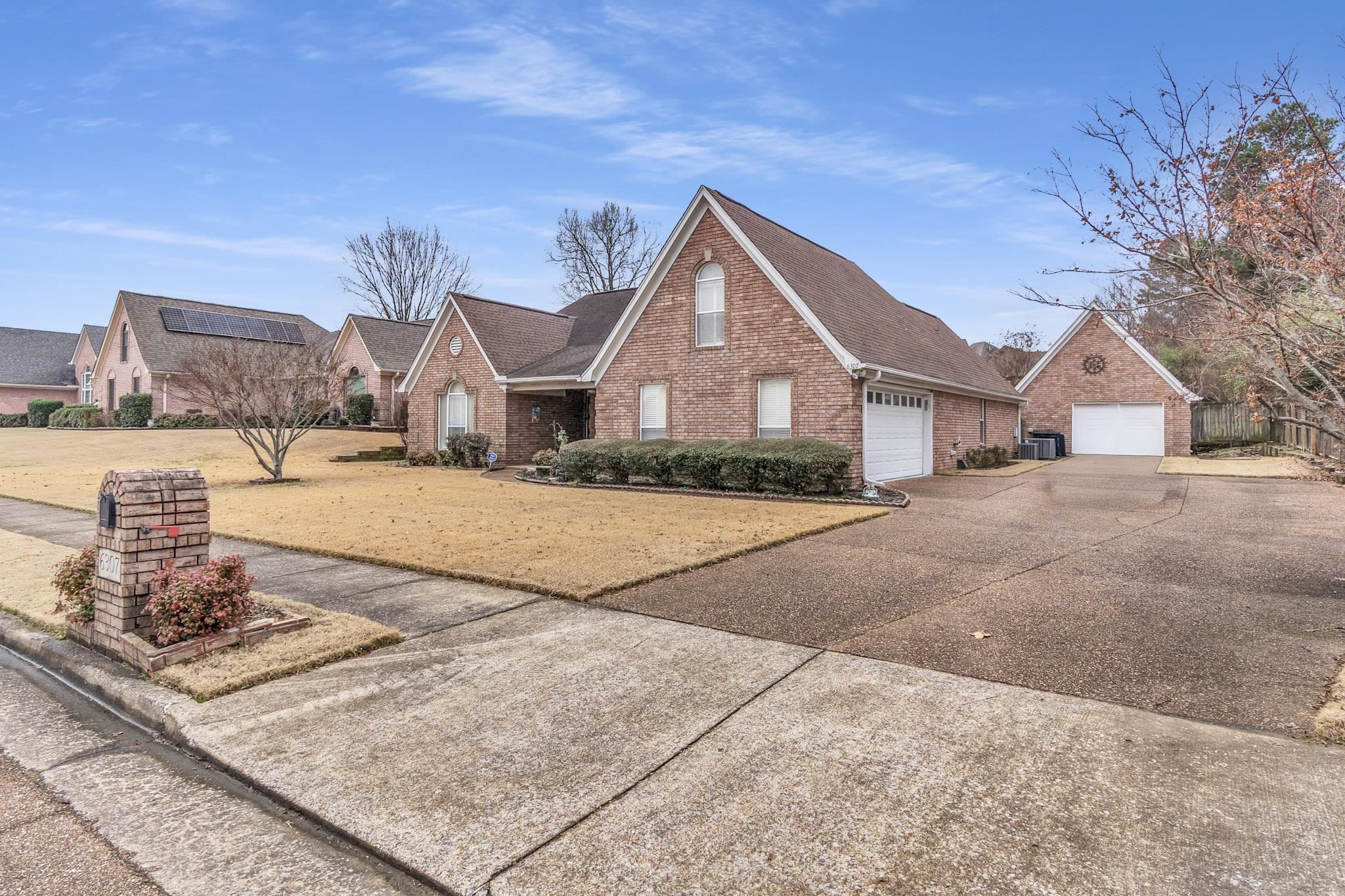 6307 Thistle Point Bartlett, TN 38135 - Photo 26 of 31 a front view of a house with a yard