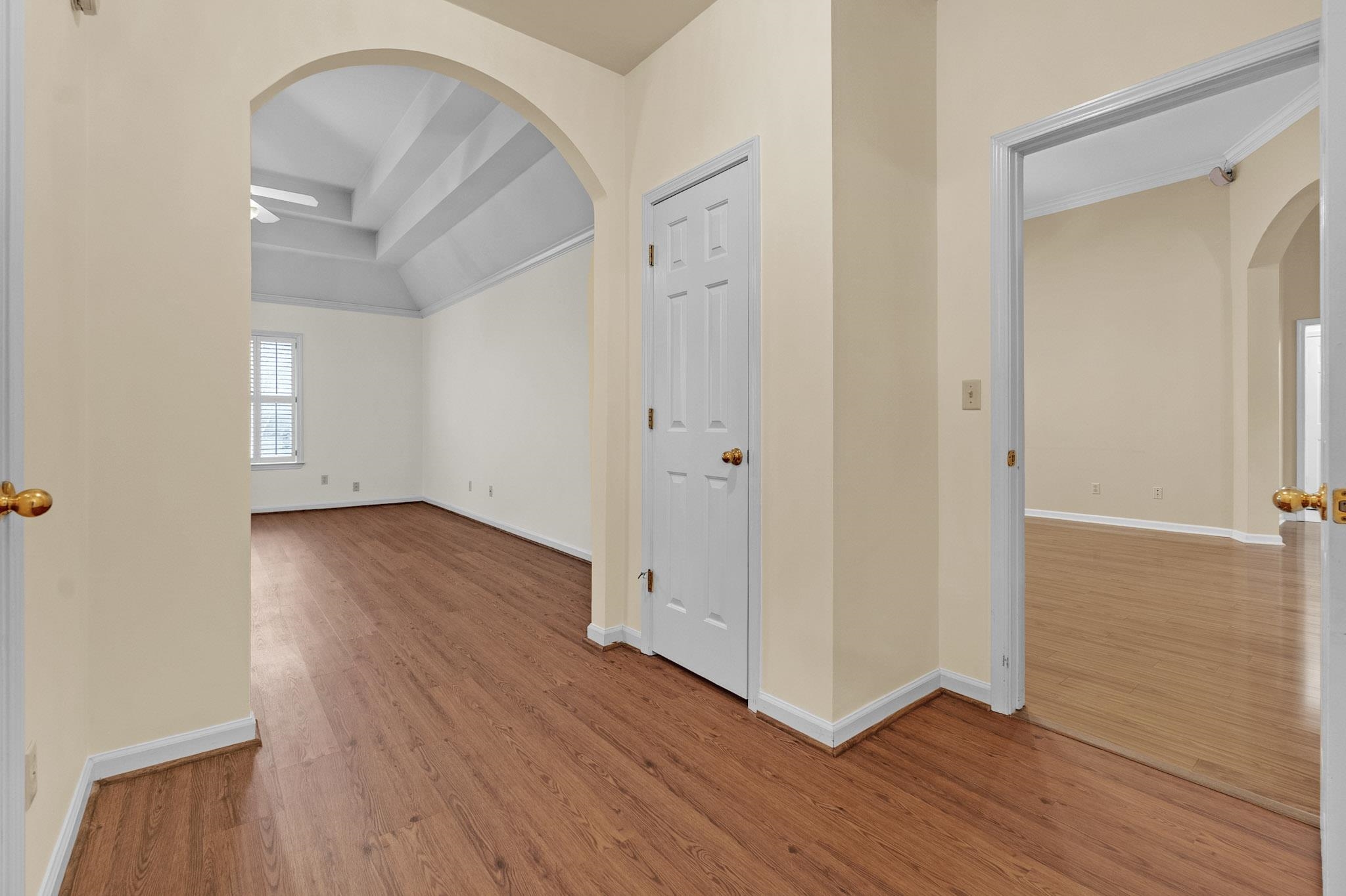 6307 Thistle Point Bartlett, TN 38135 - Photo 27 of 31 an empty room with wooden floor and windows